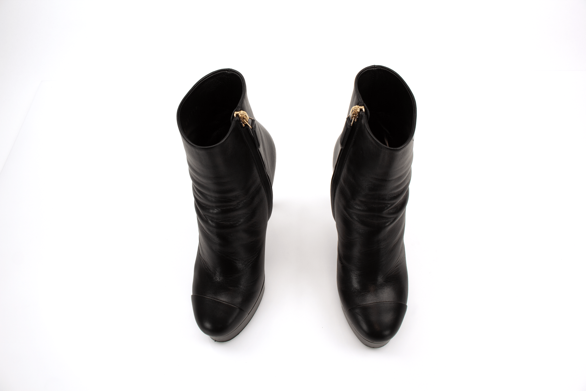 Gold & Beyond Chanel patent leather heels, stylish women's shoes with sleek shine and elegant design.