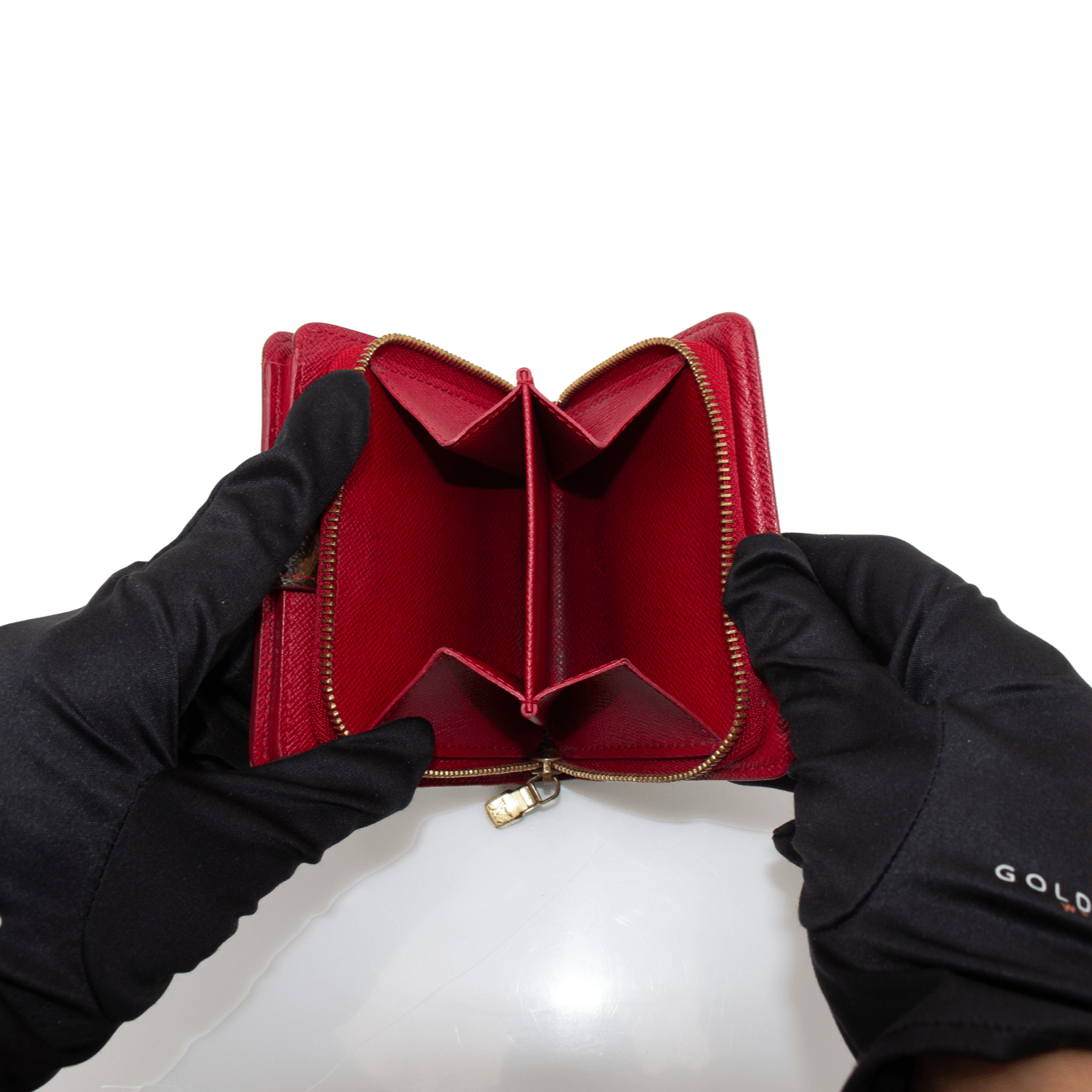 Louis Vuitton Cherry Cerise Zippy Wallet with branded zipper and interior compartments, showcasing luxury designer wallet design.