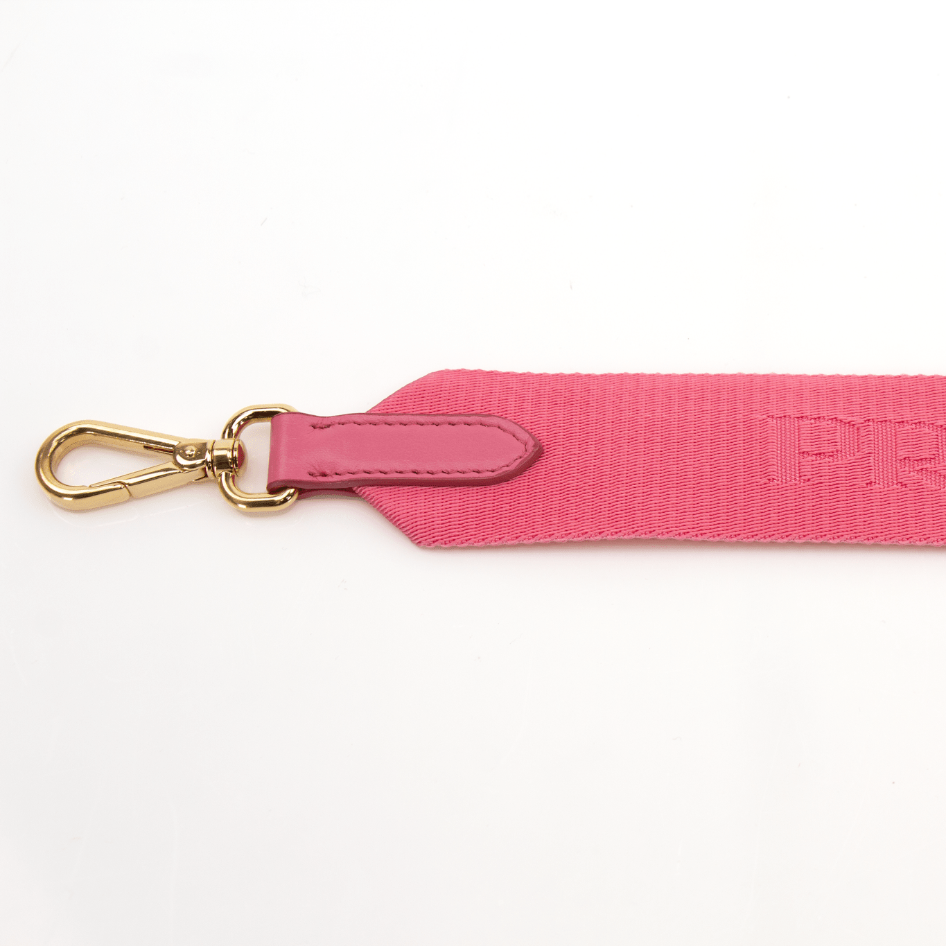 Pink Prada 2005 Re-Edition crochet handbag by Gold & Beyond, featuring a textured crochet design and stylish hand strap.