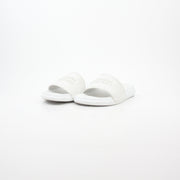 White Alexander McQueen logo pool slide sandals shown with open toe design and slip-on style on a flat surface.