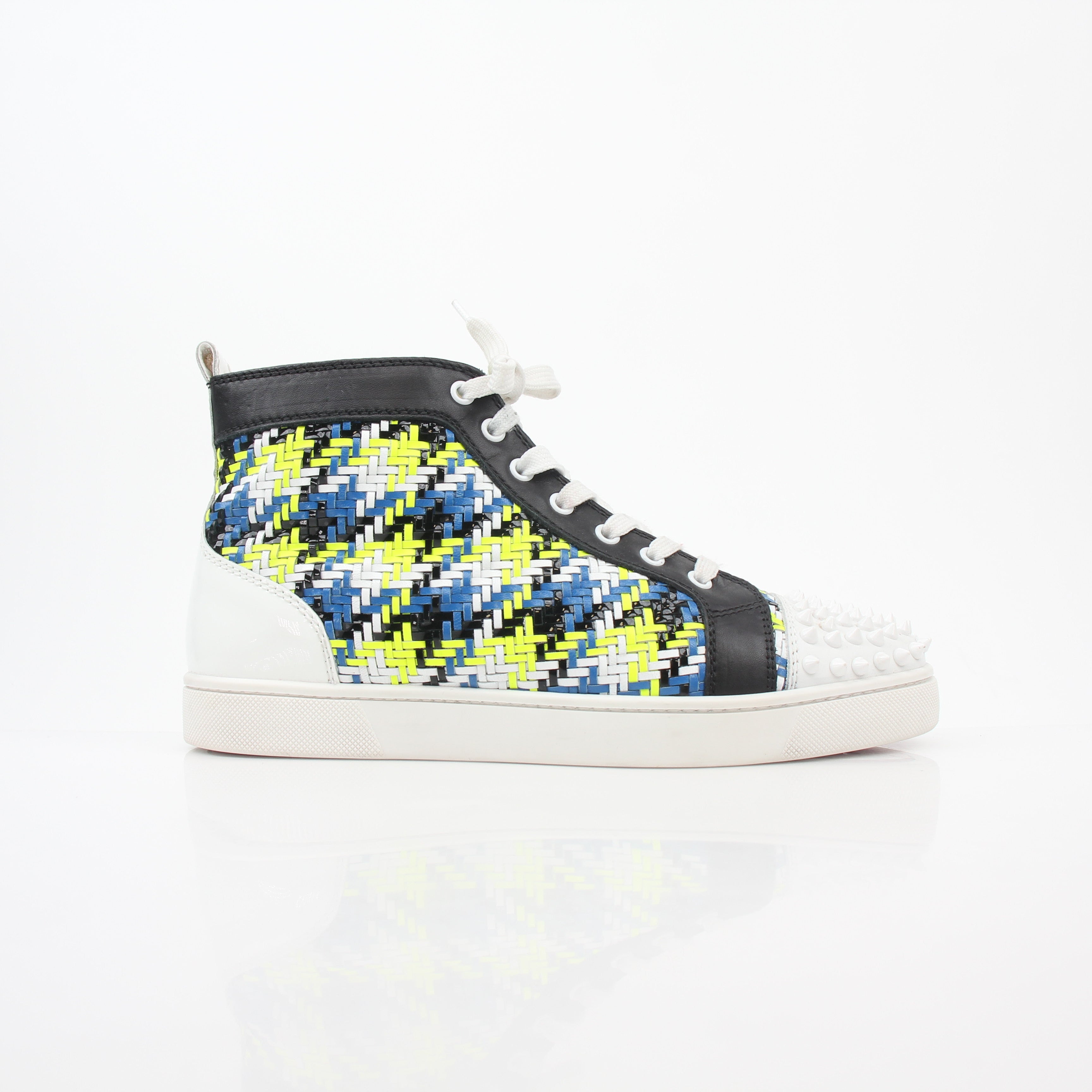Close-up of Christian Louboutin Multicolor Louis Spikes high-top sneakers with signature spikes and vibrant color accents.