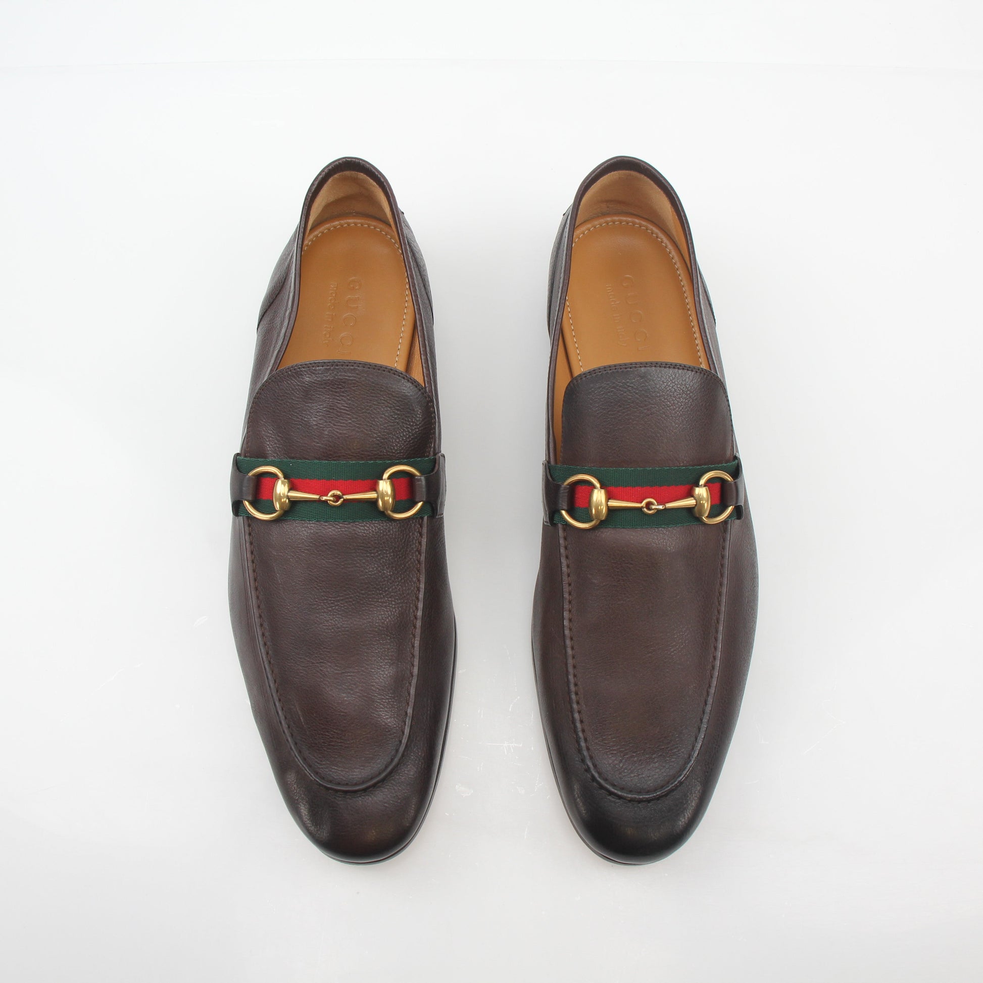 Gold & Beyond Gucci brown leather horsebit web loafers with classic slip-on design and stylish horsebit detail.