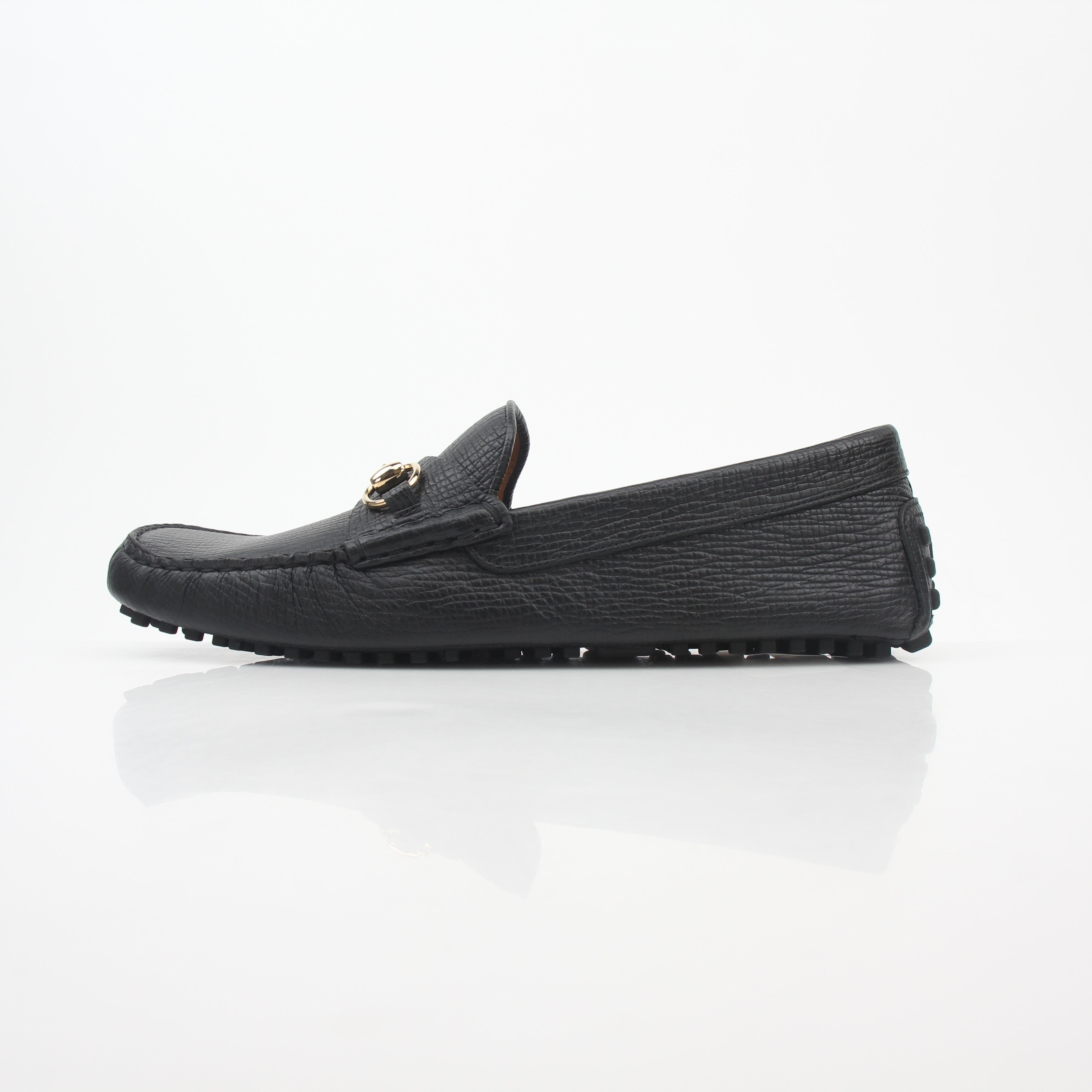 Gucci black leather Ayrton horsebit driving loafers for men, featuring sleek leather construction and signature horsebit detail.