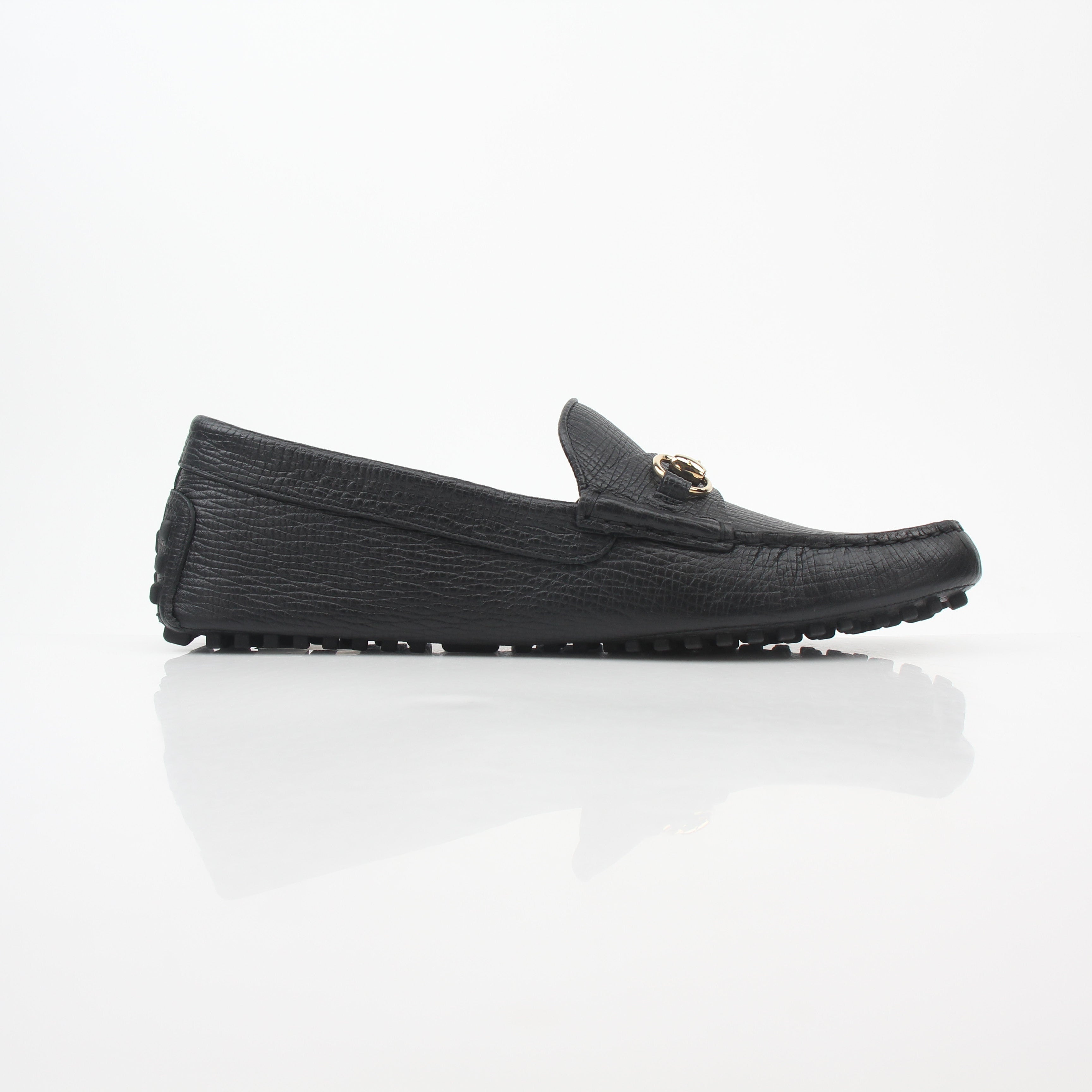 Gucci black leather Ayrton horsebit driving loafers, men's shoes with sleek design and signature horsebit detail.