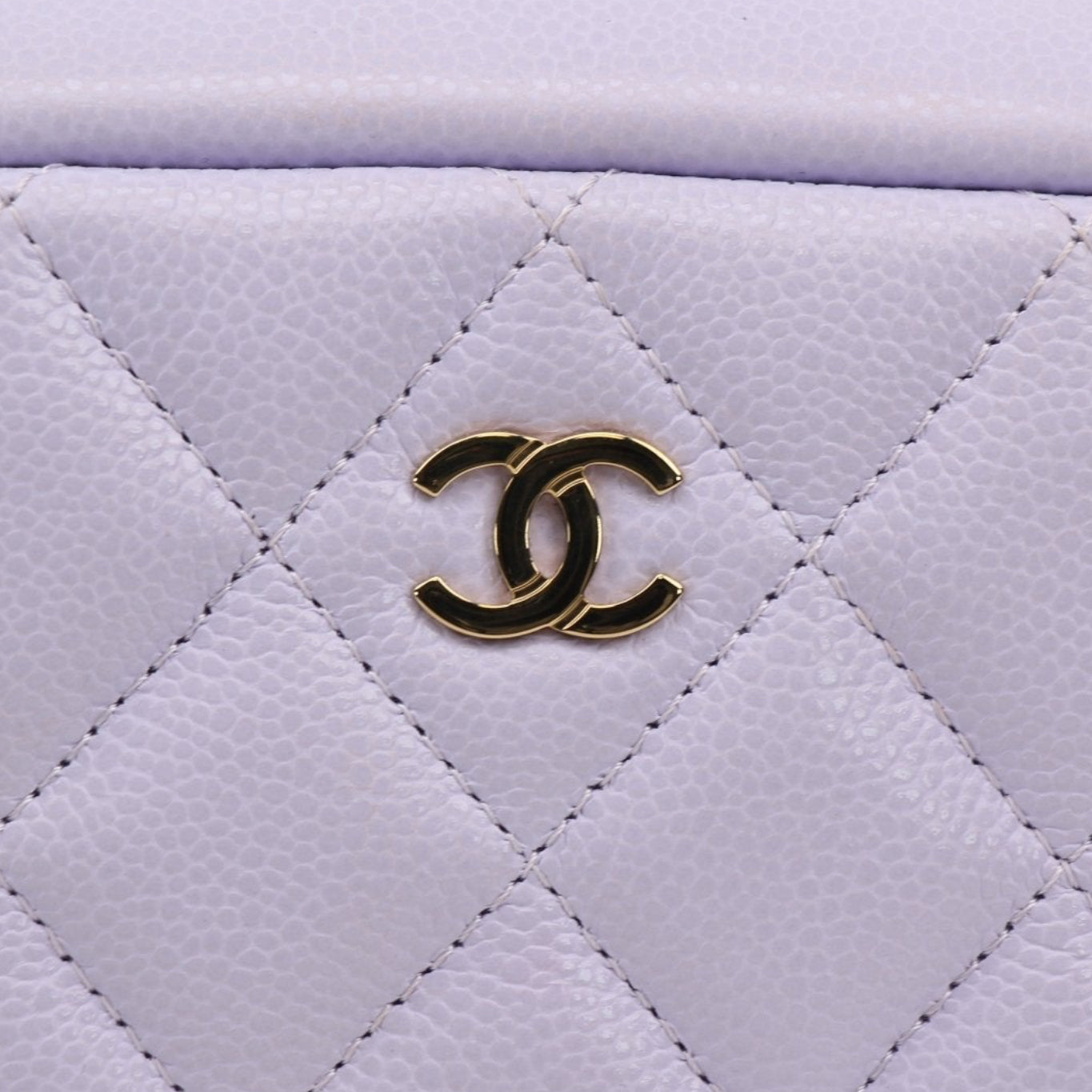 Gold & Beyond Chanel Vanity Top Zipper Bag handbag with sleek design and zipper closure, perfect for stylish accessories.