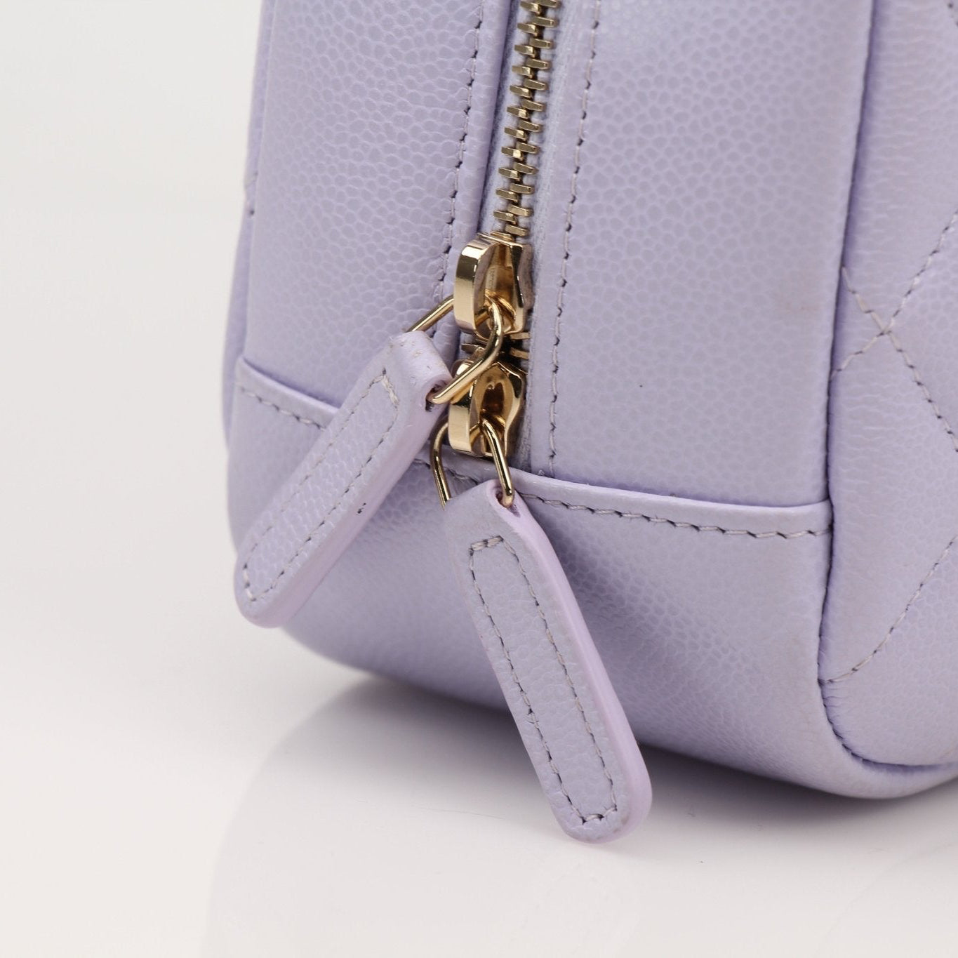 Gold & Beyond Chanel Vanity Top Zipper Bag handbag with sleek design and top zipper closure, shown in the product image.