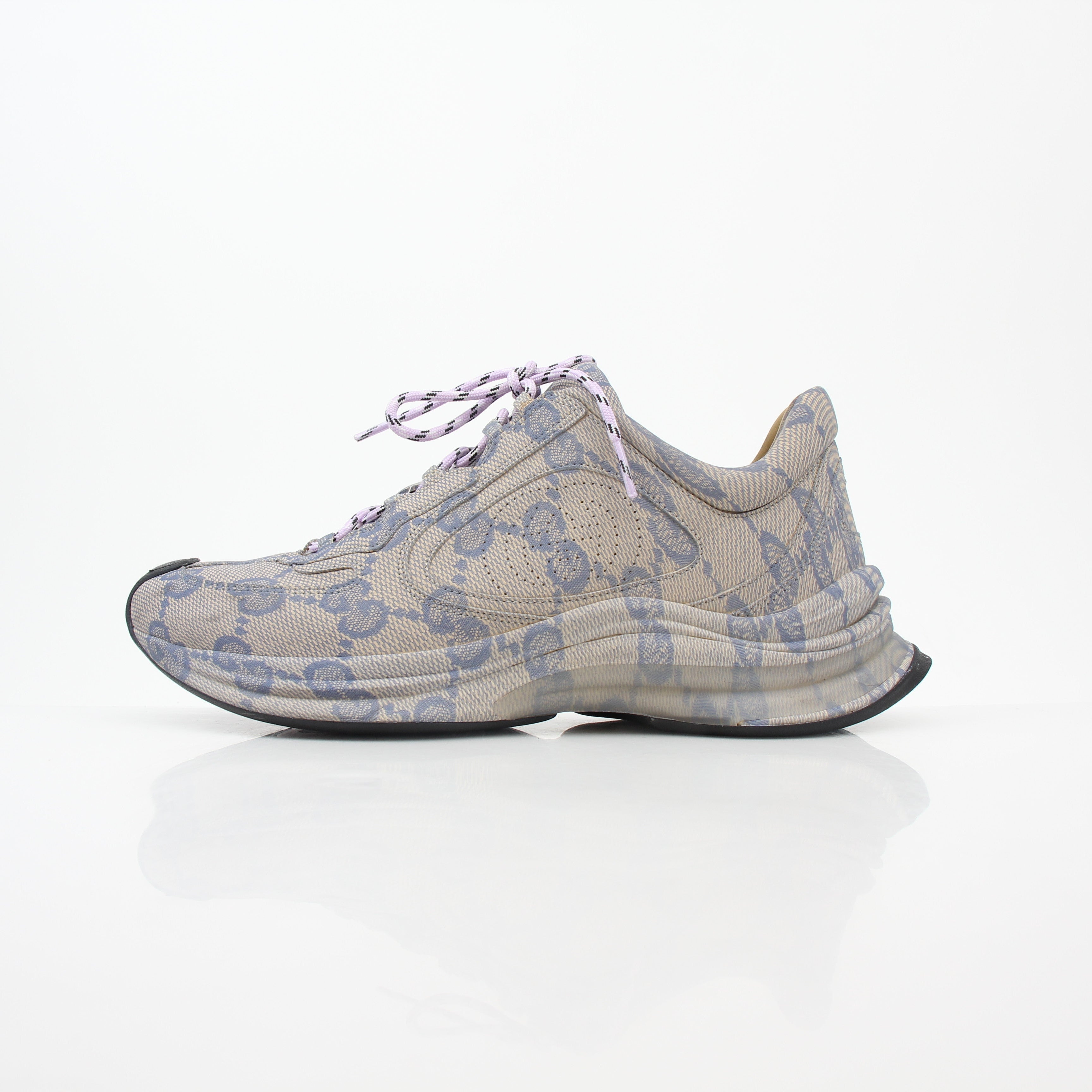 Gucci beige GG monogram Run sneakers with white soles and beige laces, stylish casual shoes from Gold & Beyond