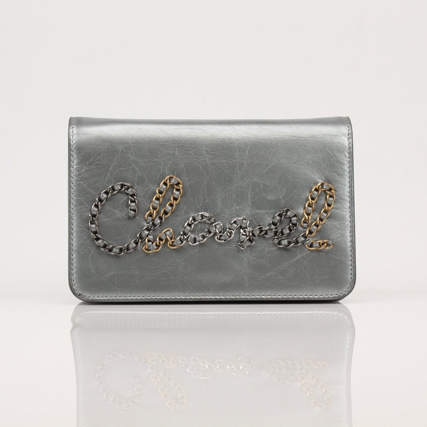 Gold & Beyond Chanel 20s Signature Wallet on Chain handbag with quilted design and gold-tone chain strap.