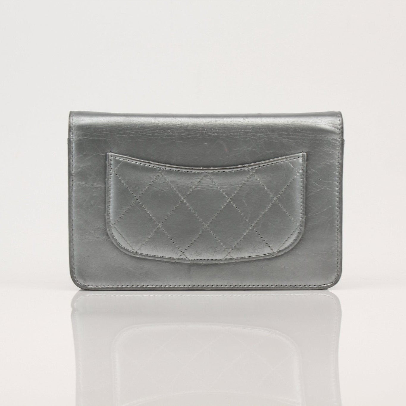 Gold & Beyond Chanel 20s Signature Wallet on Chain handbag, elegant black leather with gold accents and signature quilting.