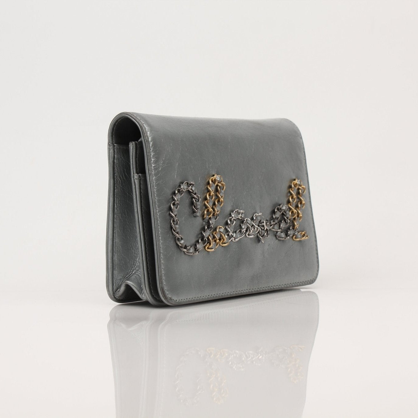 Gold & Beyond Chanel 20s Signature Wallet on Chain handbag with quilted design and gold-tone chain strap.
