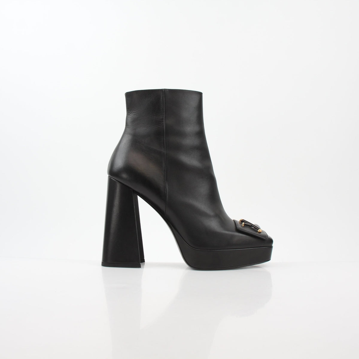 Black Louis Vuitton Shake Platform Ankle Boots by Gold & Beyond, stylish shoes with chunky heels and sleek design.