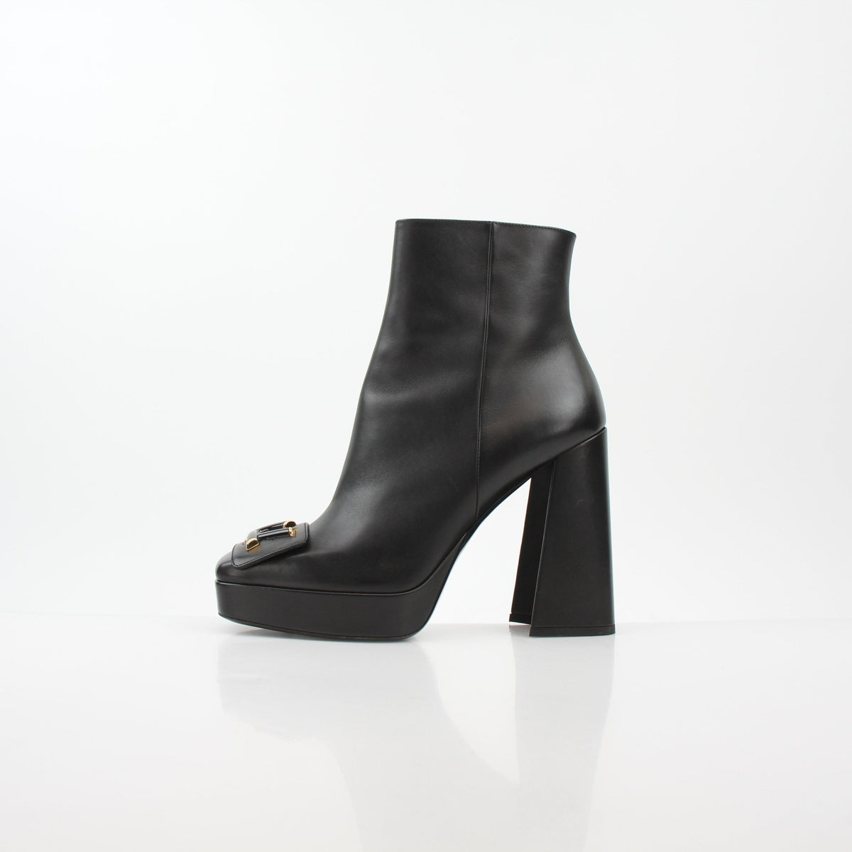 Black Louis Vuitton Shake Platform Ankle Boots by Gold & Beyond, stylish shoes with chunky soles and sleek design.