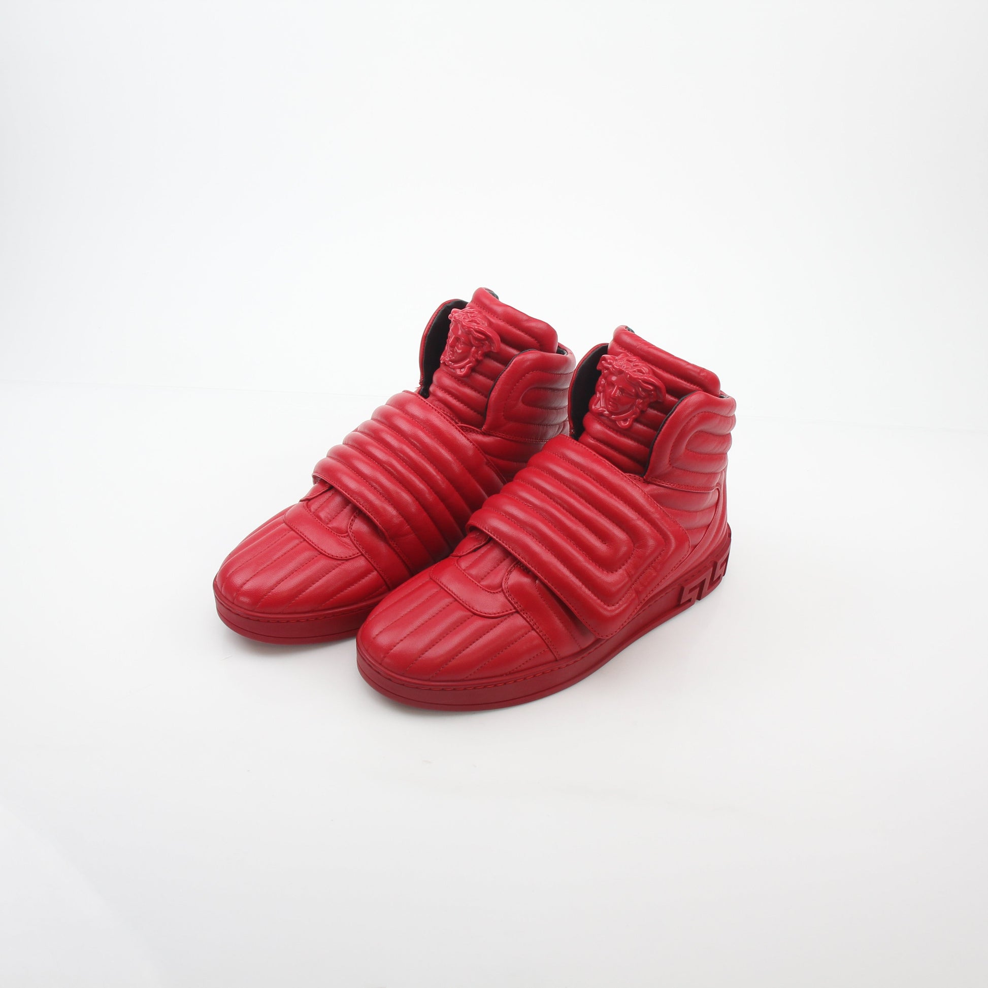 Gold & Beyond Versace Red Aros quilted leather high-top sneakers with stylish design and branding details.