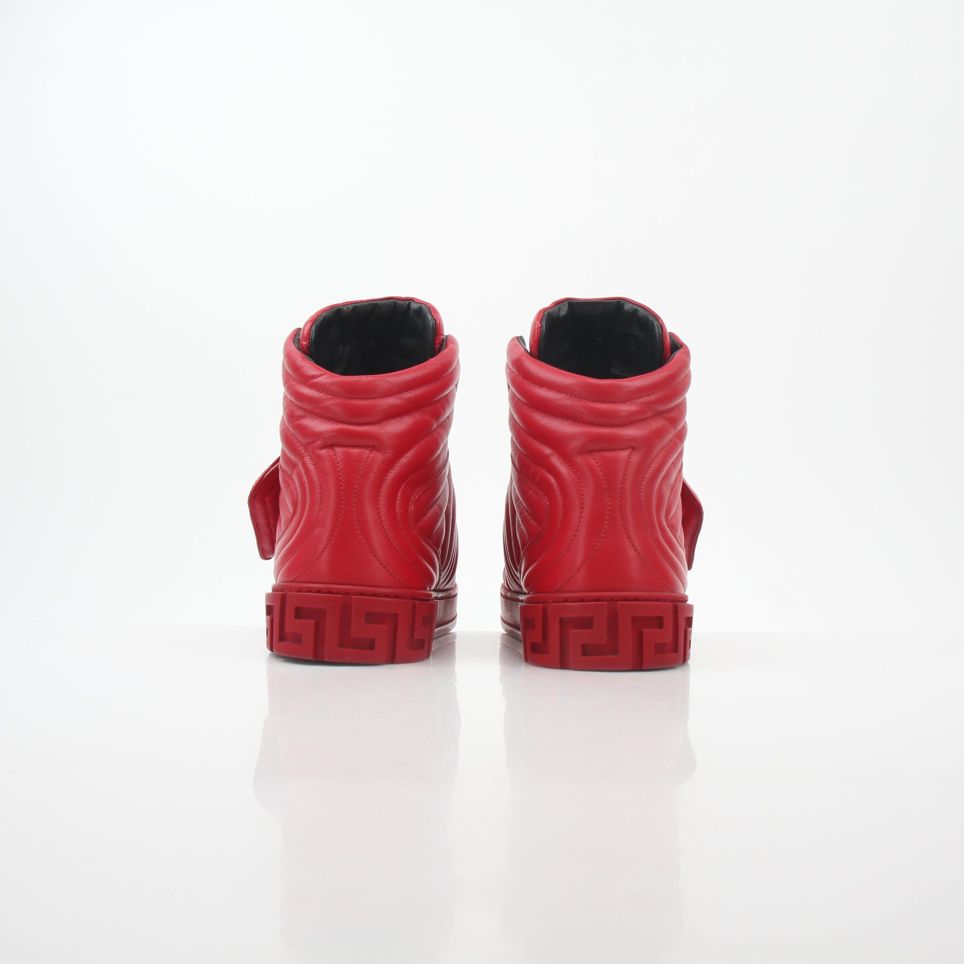 Gold & Beyond Versace Red Aros quilted leather high-top sneakers with stylish design and high-top shoe silhouette.