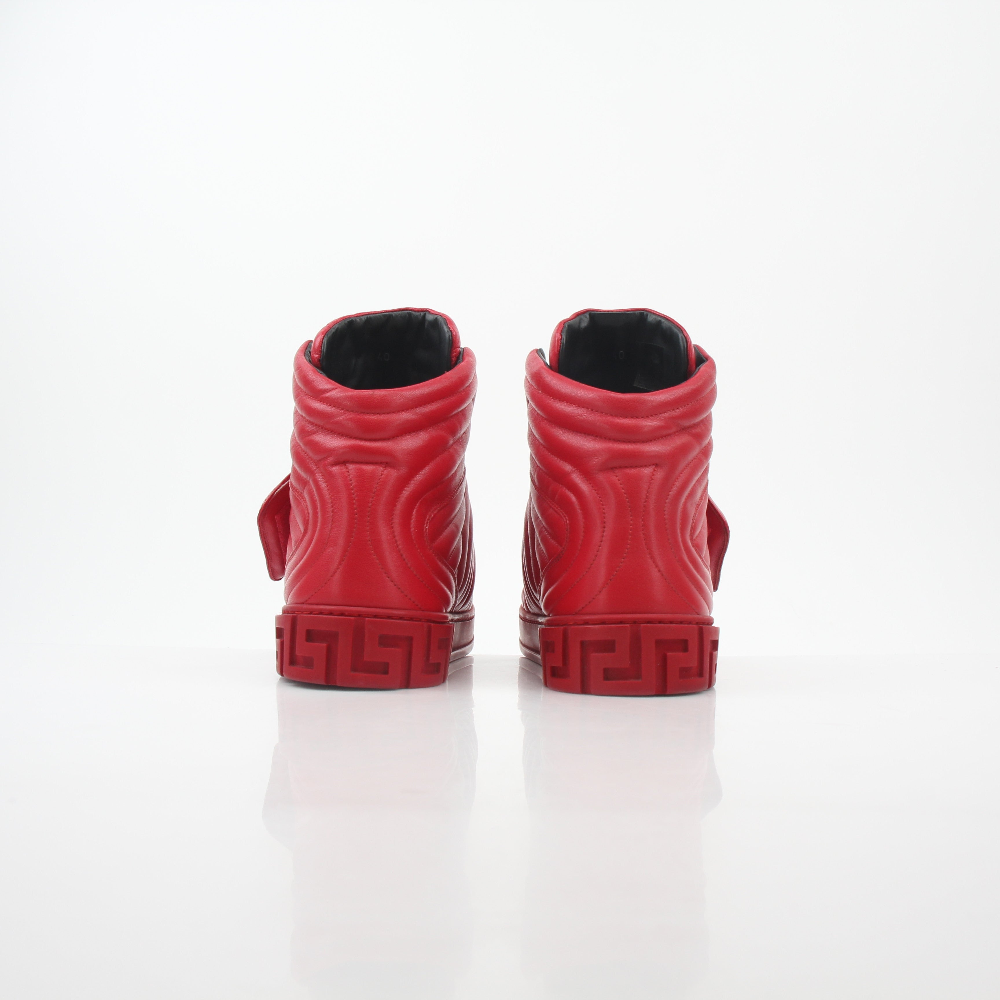 Gold & Beyond Versace Red Aros quilted leather high-top sneakers with stylish design and high-top shoe silhouette.