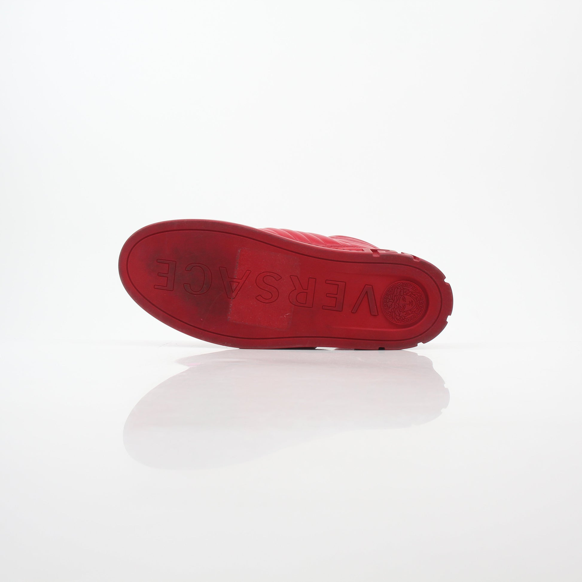 Gold & Beyond Versace Red Aros quilted leather high-top sneakers showing bold red leather with quilted design and high-top style.