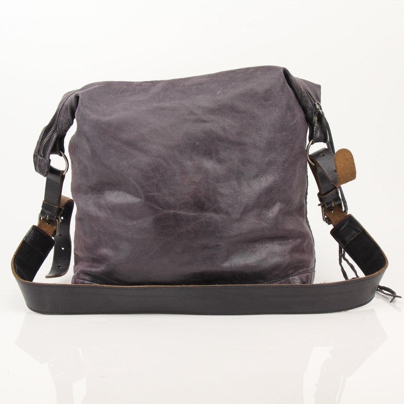 Purple distressed Balenciaga messenger handbag with adjustable strap and bold designer style, stylish and spacious for everyday use.