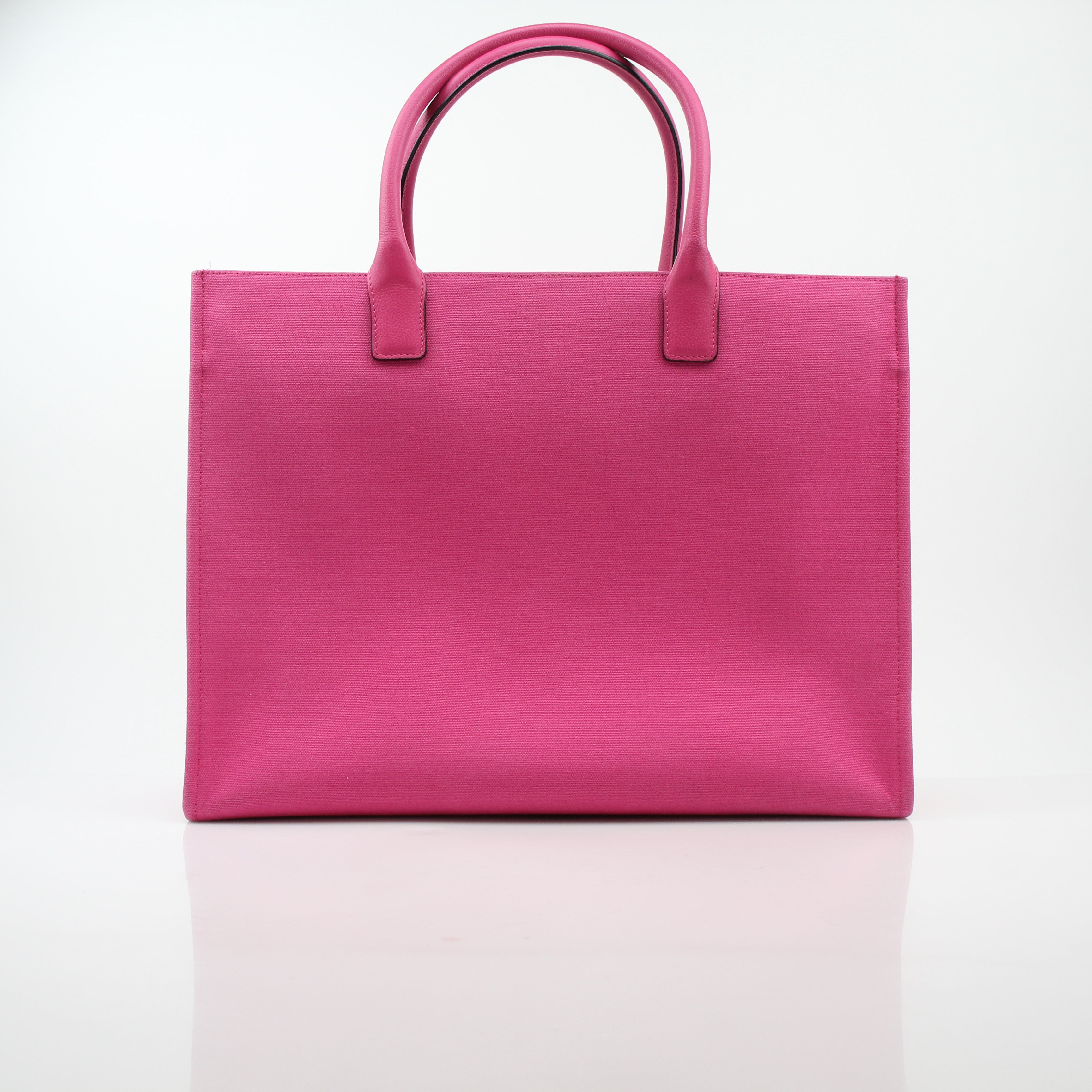 Pink Versace La Medusa embossed canvas tote bag, stylish handbag with gold accents and Medusa logo, designed by Gold & Beyond.