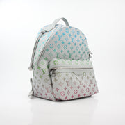 Louis Vuitton Iridescent Monogram Discovery Backpack PM, luxury travel bag with iridescent monogram and adjustable straps.