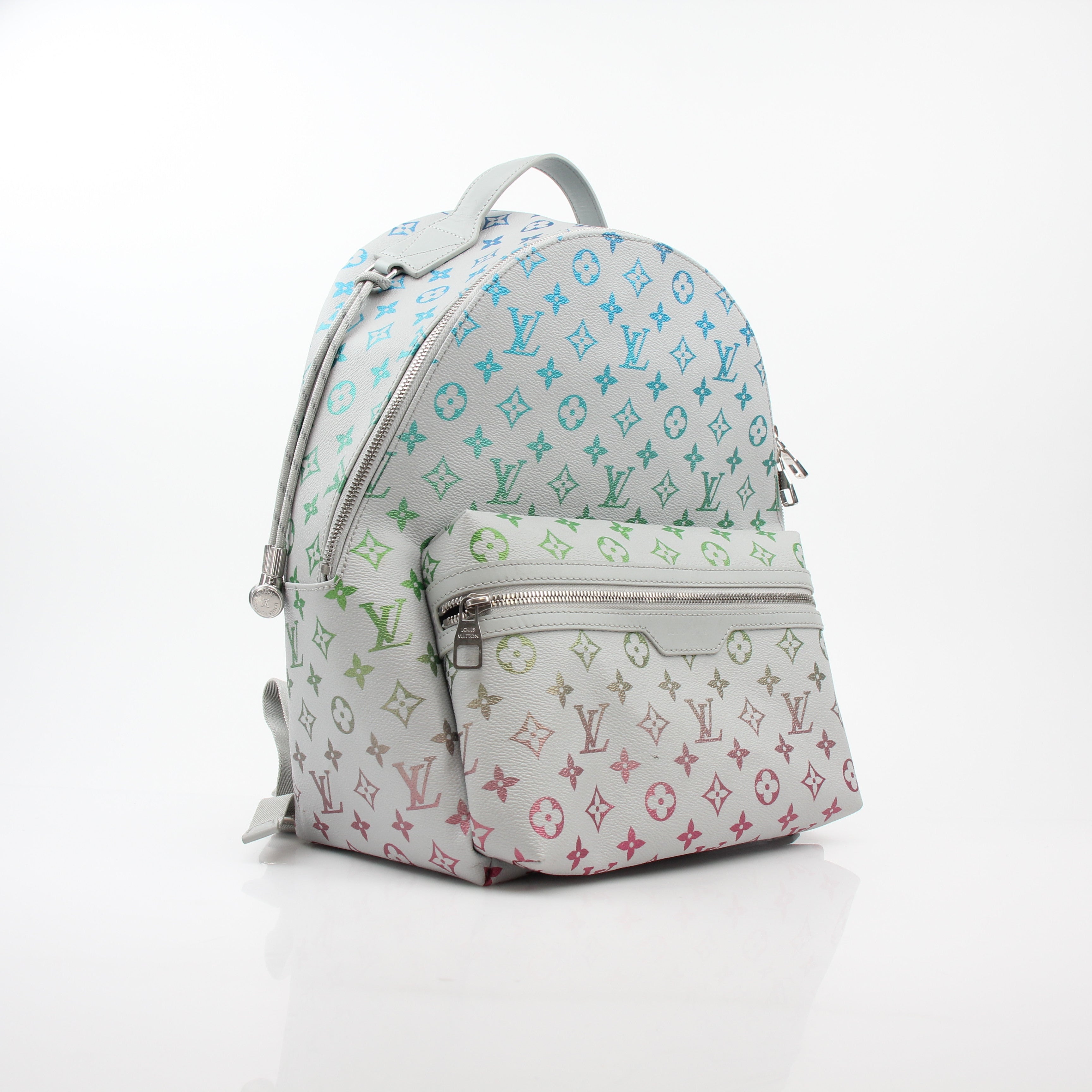 Louis Vuitton Iridescent Monogram Discovery Backpack PM, luxury travel bag with iridescent monogram and adjustable straps.
