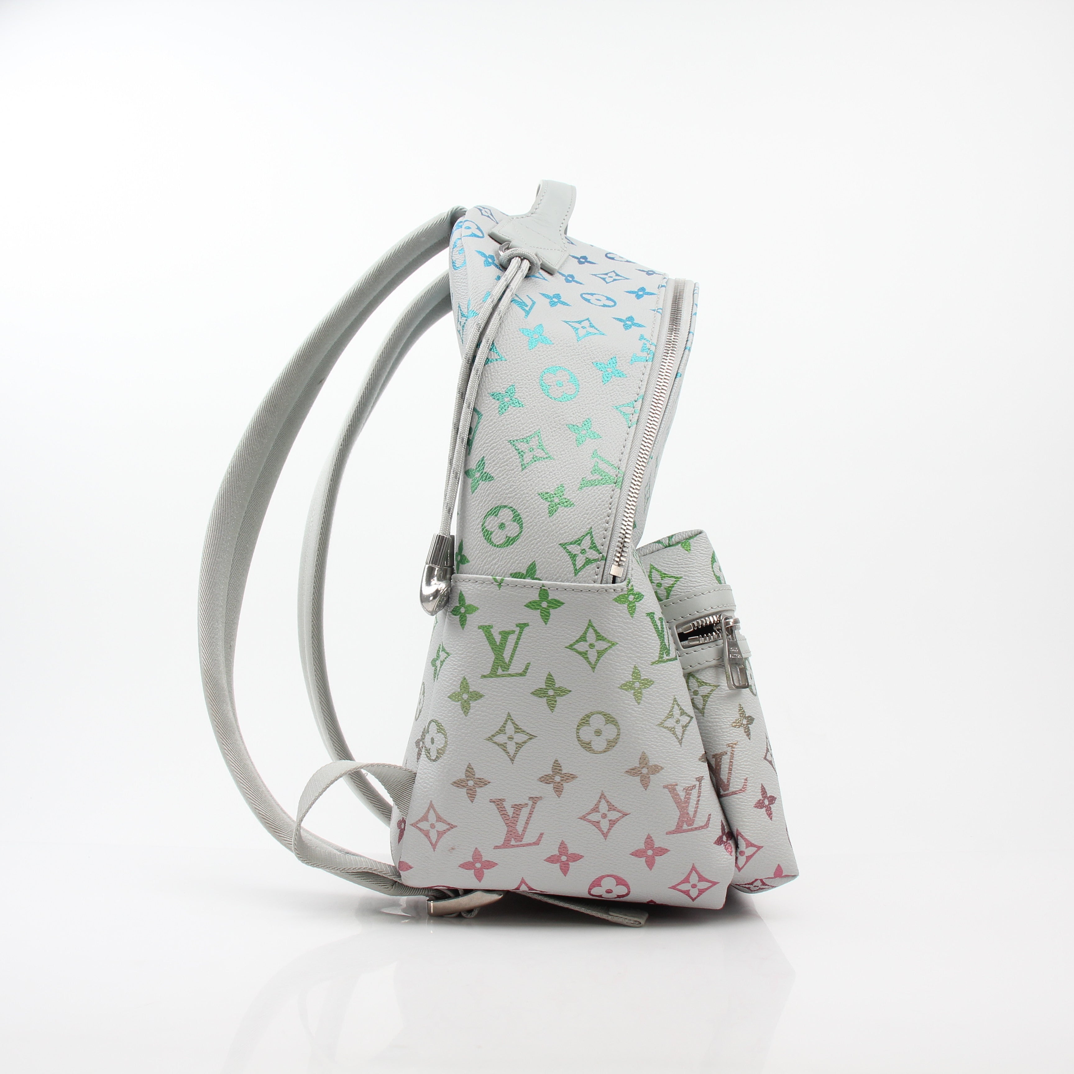 Louis Vuitton Iridescent Monogram Discovery Backpack PM, a stylish travel bag with metallic finish and monogram pattern.