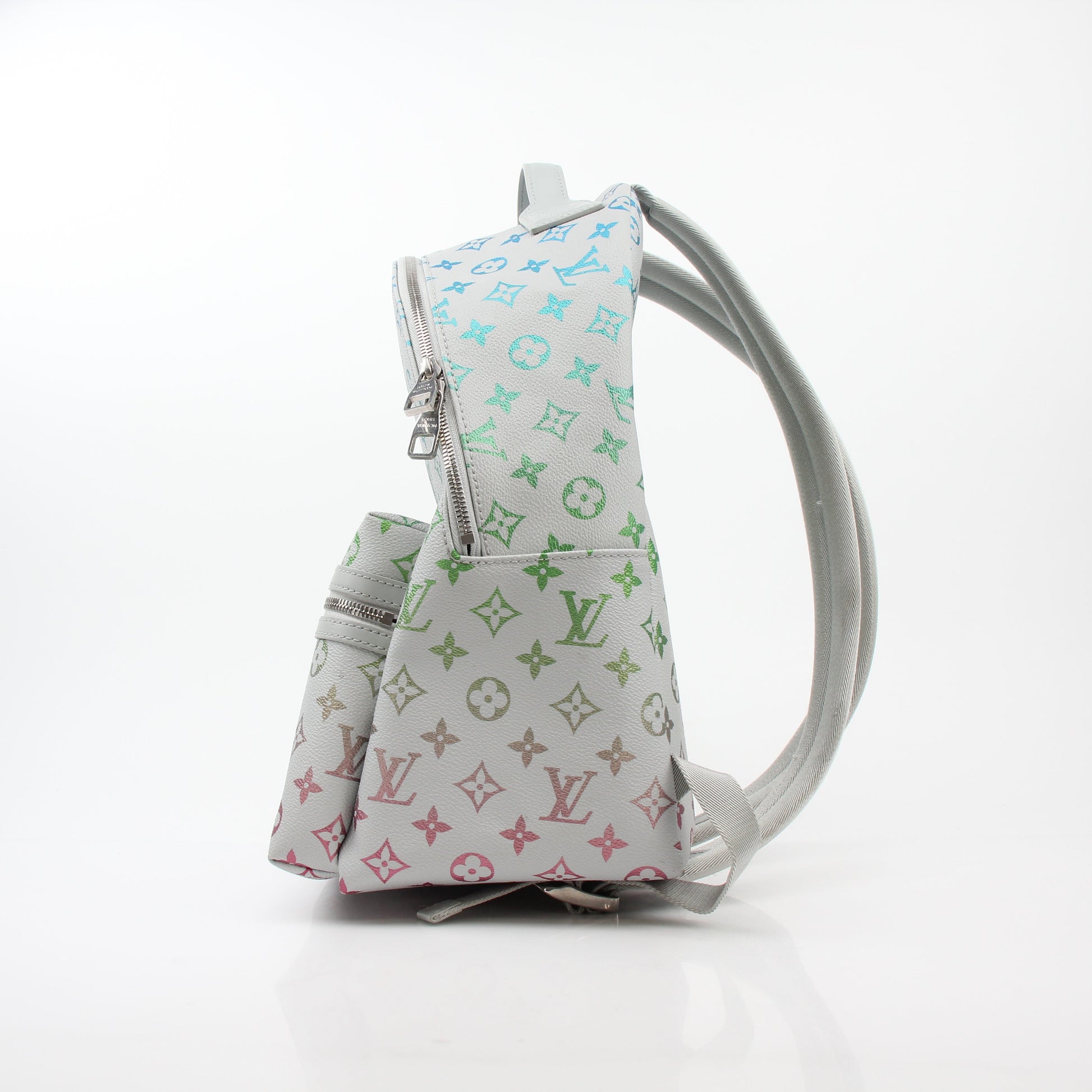 Louis Vuitton Iridescent Monogram Discovery Backpack PM, luxury travel bag with shimmering monogram design and adjustable straps.