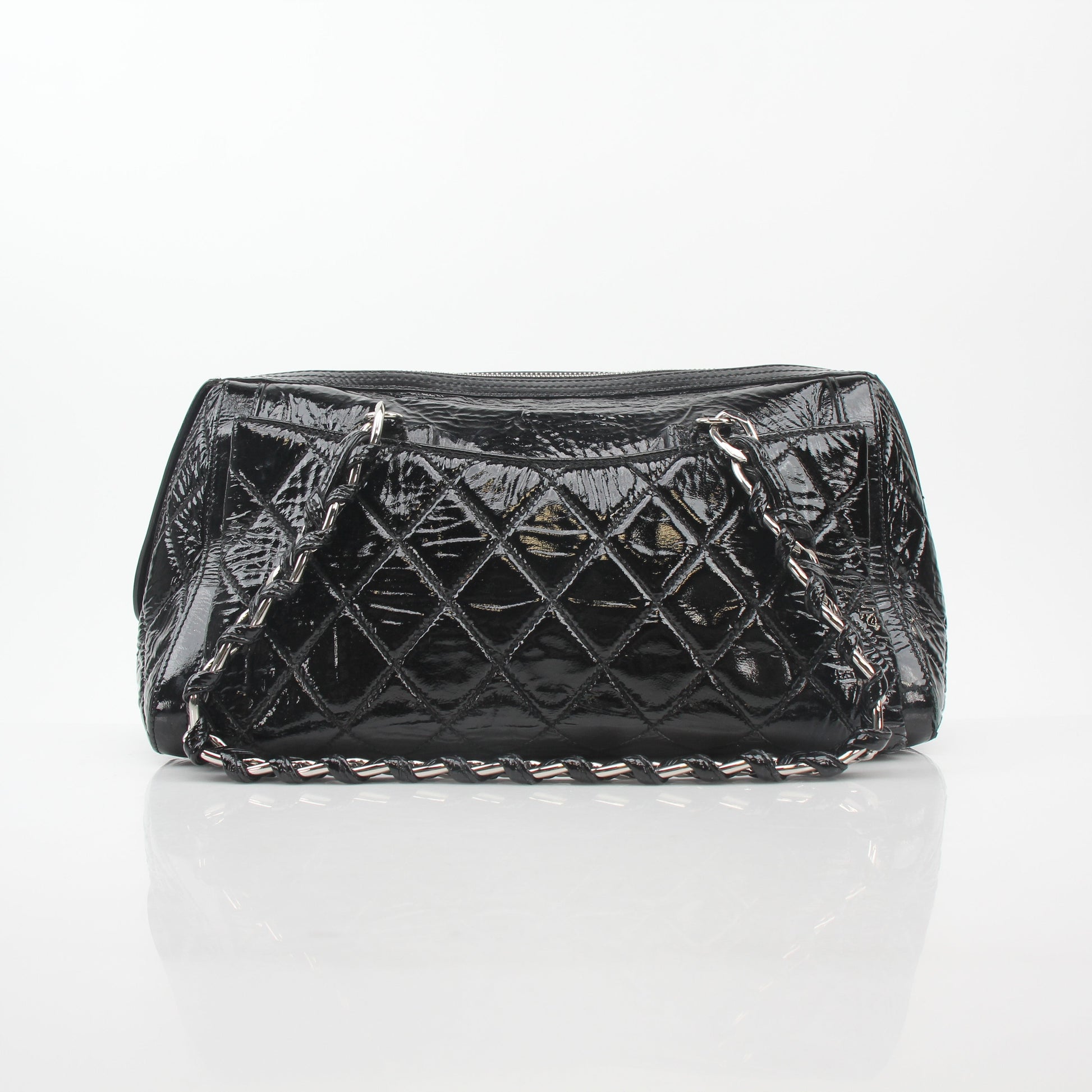 Gold & Beyond black quilted patent Chanel style handbag with glossy flap and gold chain strap.
