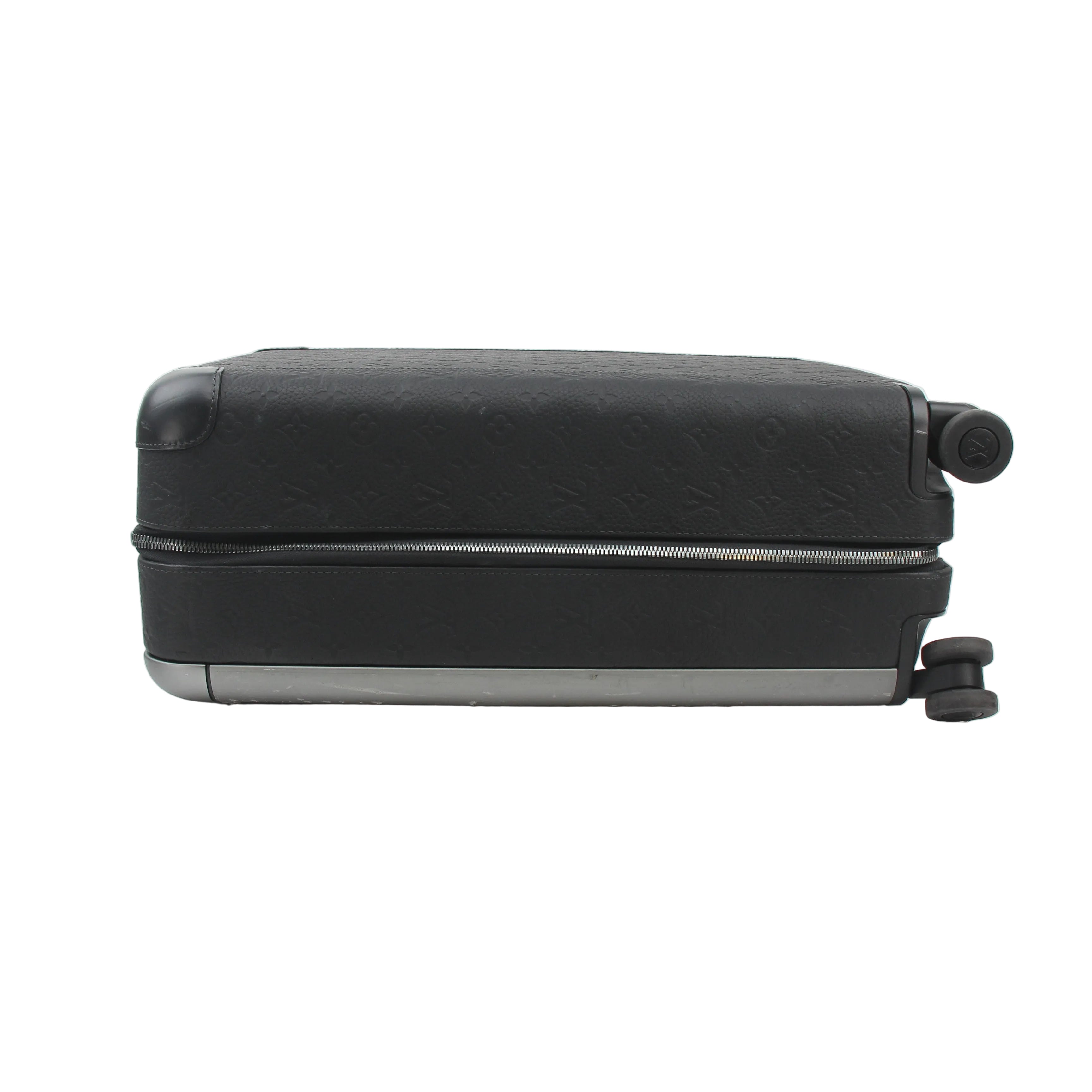 Black Louis Vuitton Horizon 55 Taurillon Monogram rolling luggage, durable travel bag with sleek design.