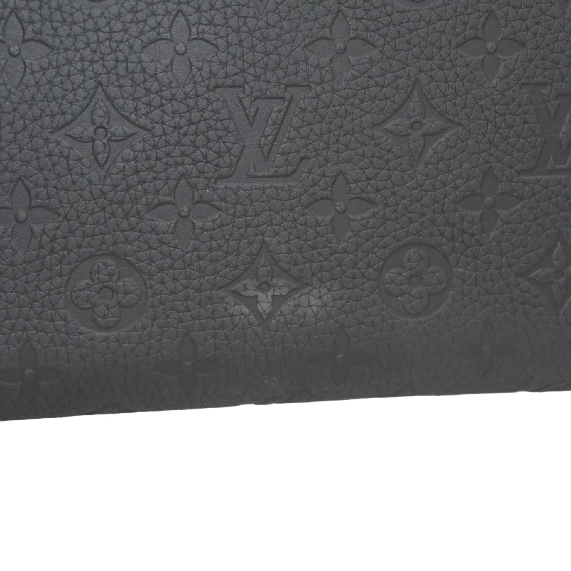 Louis Vuitton Black Horizon 55 Taurillon Monogram rolling luggage with retractable handle and four wheels, designed for travel.
