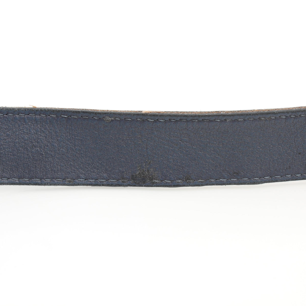 Blue Louis Vuitton Monogram Shadow Discovery Bumbag handbag with adjustable strap and gold-tone hardware on a plain background.