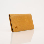Louis Vuitton Epi yellow wallet from Gold & Beyond, featuring textured leather and a compact, stylish design.