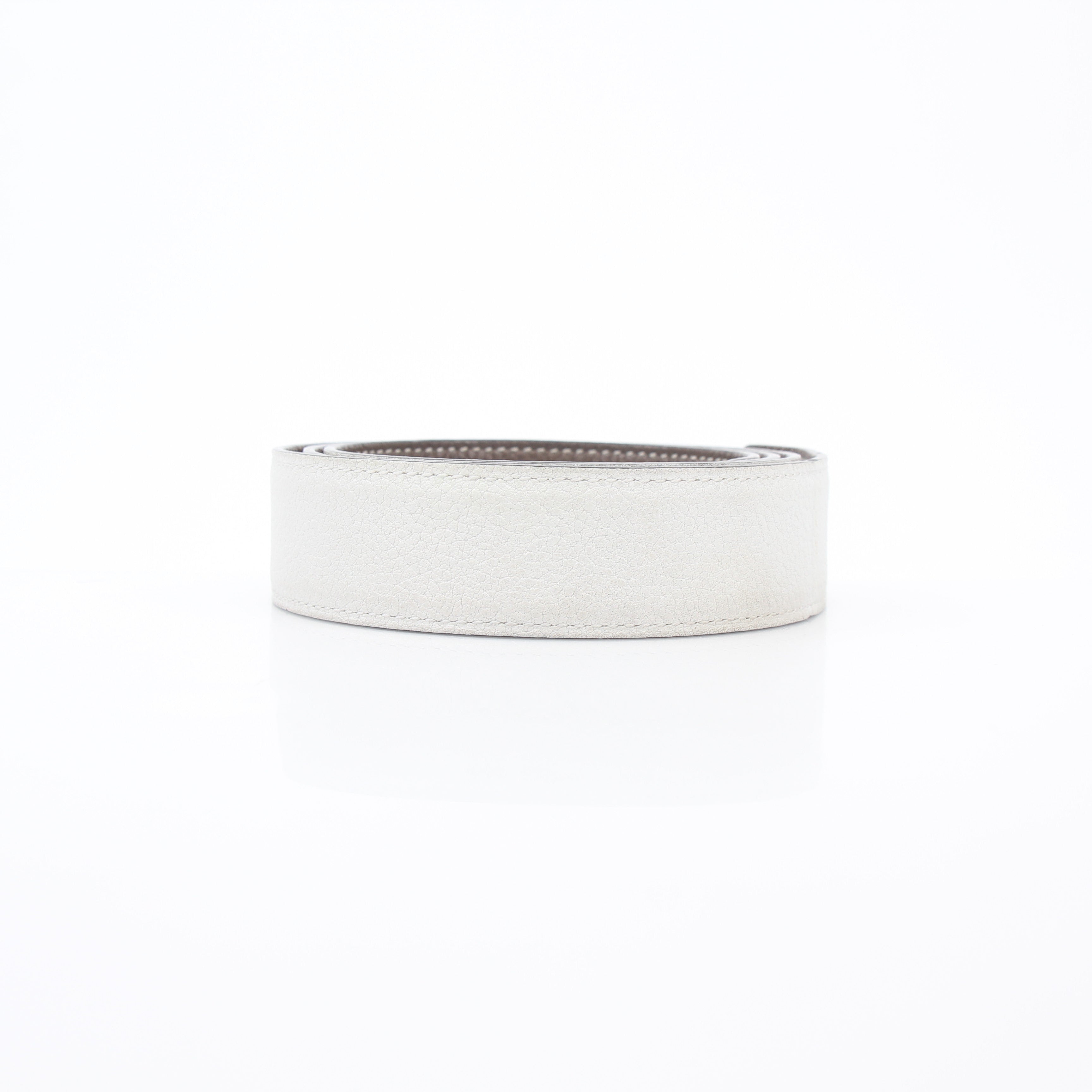 Hermès white and Etoupe reversible leather belt strap for accessories, featuring a sleek design and high-quality craftsmanship.