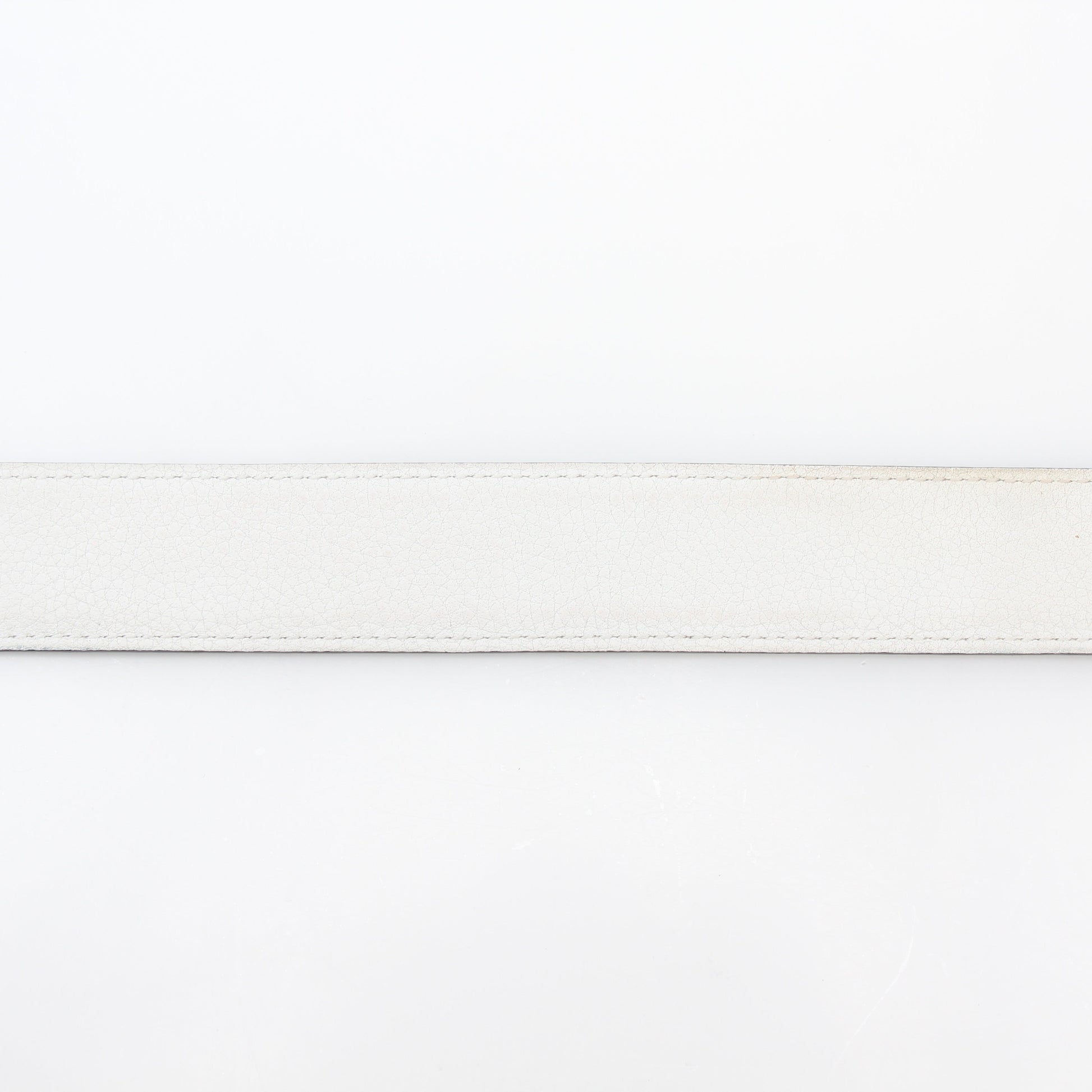 Hermès reversible leather belt strap in white and etoupe with gold hardware, designed for stylish accessories.