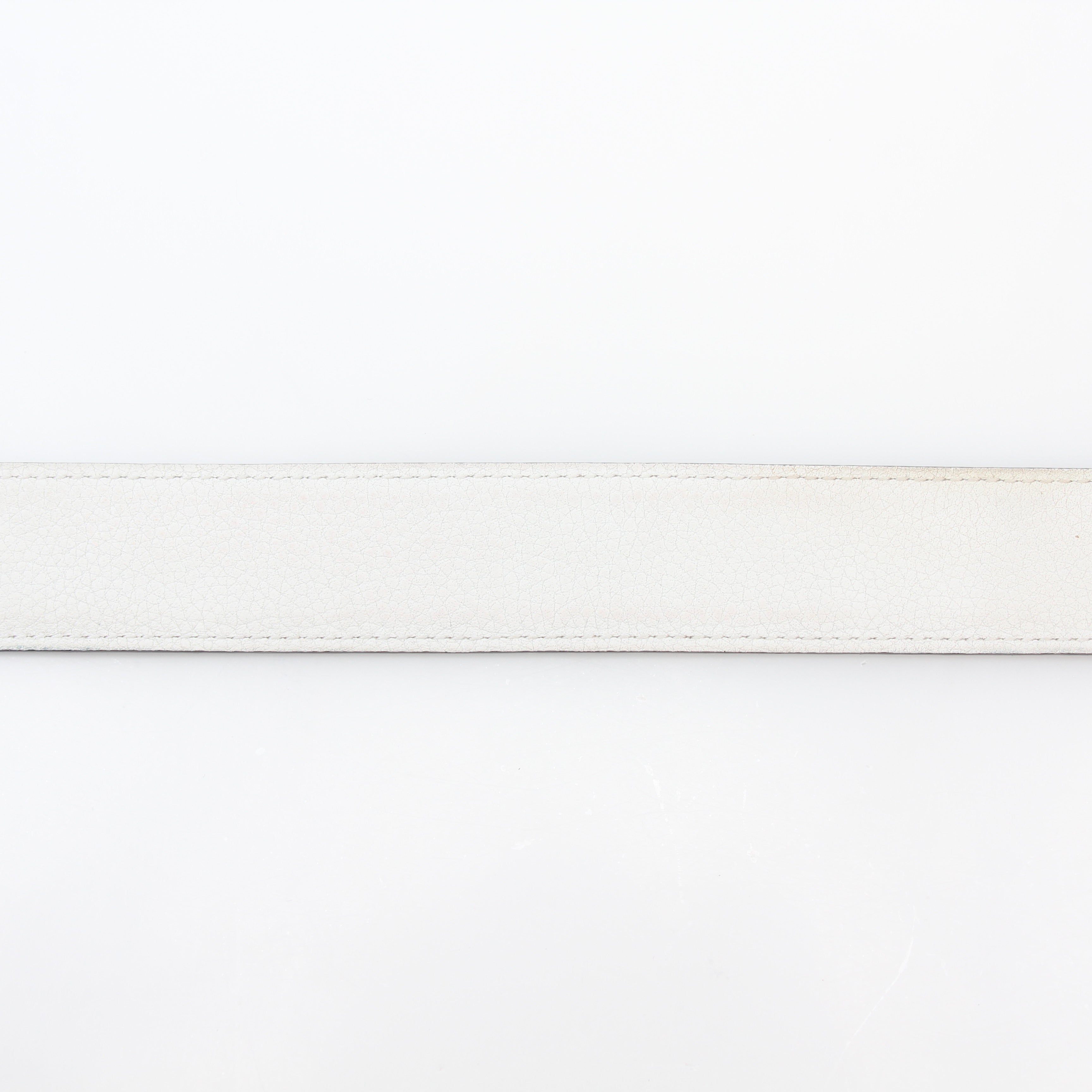 Hermès reversible leather belt strap in white and etoupe with gold hardware, designed for stylish accessories.