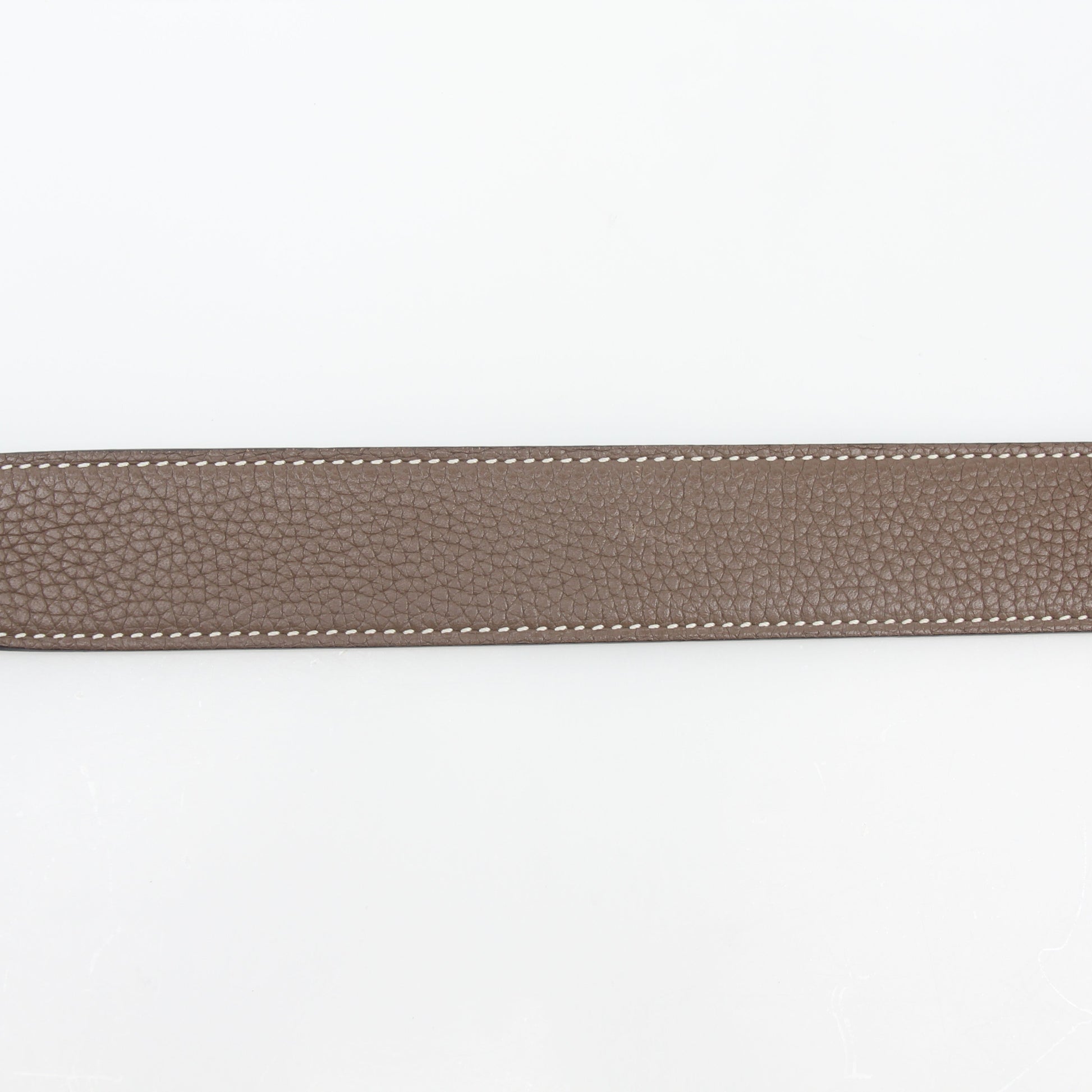 Hermès white and Etoupe reversible leather belt strap, 90/36, showcased on a flat surface with detailed texture and stitching.