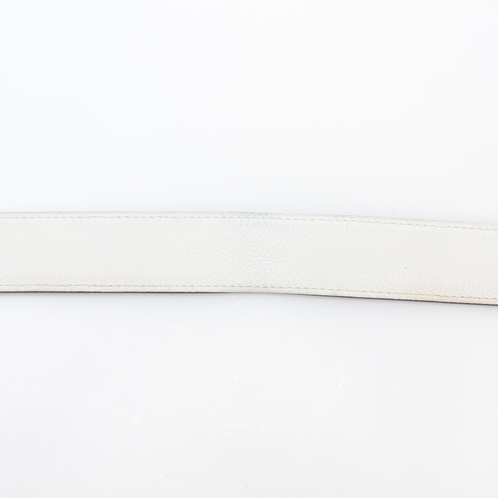 Hermès white and Etoupe reversible leather belt strap with gold hardware, 36 inches, displayed on a neutral background.