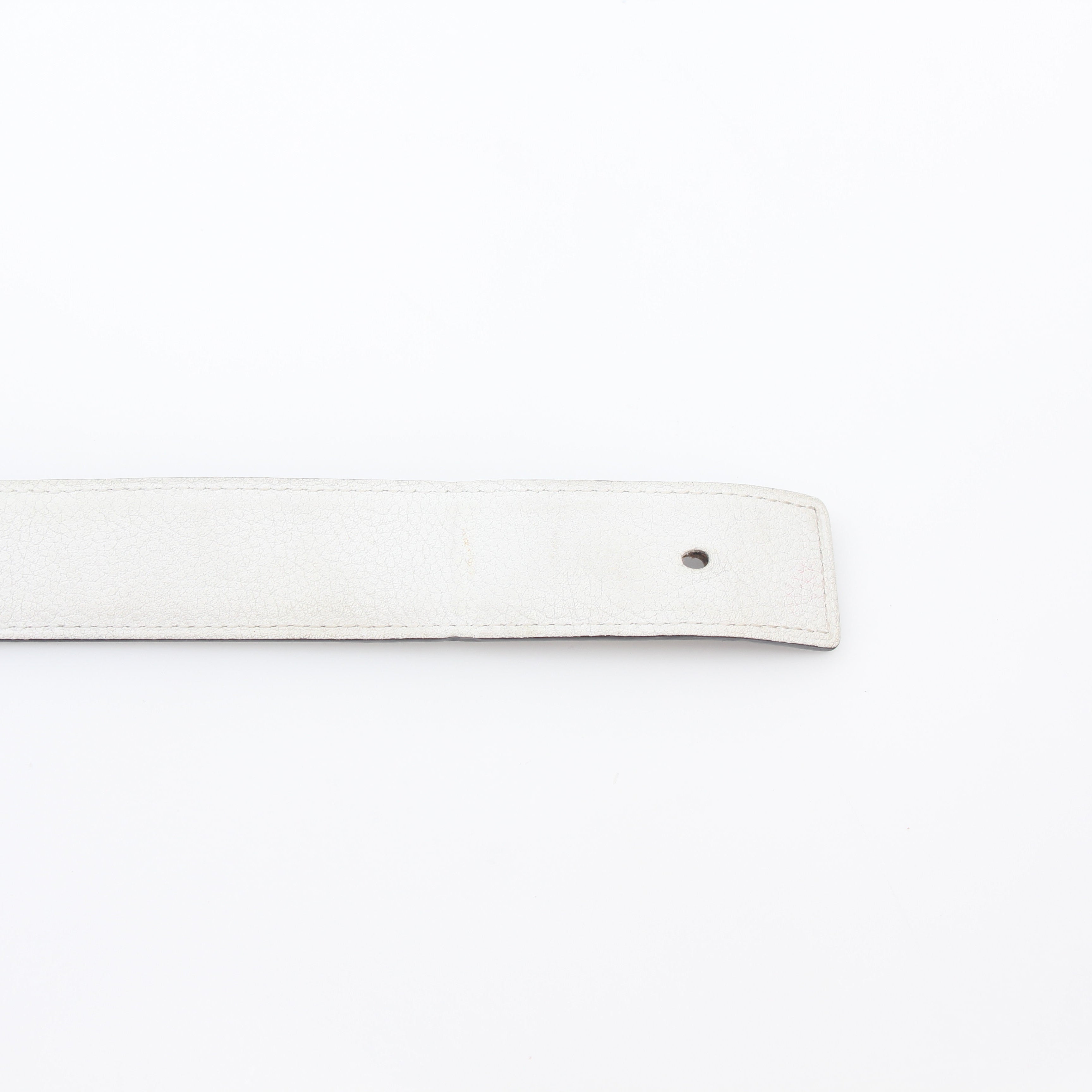 Hermès white and Etoupe reversible leather belt strap by Gold & Beyond, showing the smooth leather surface and reversible design.