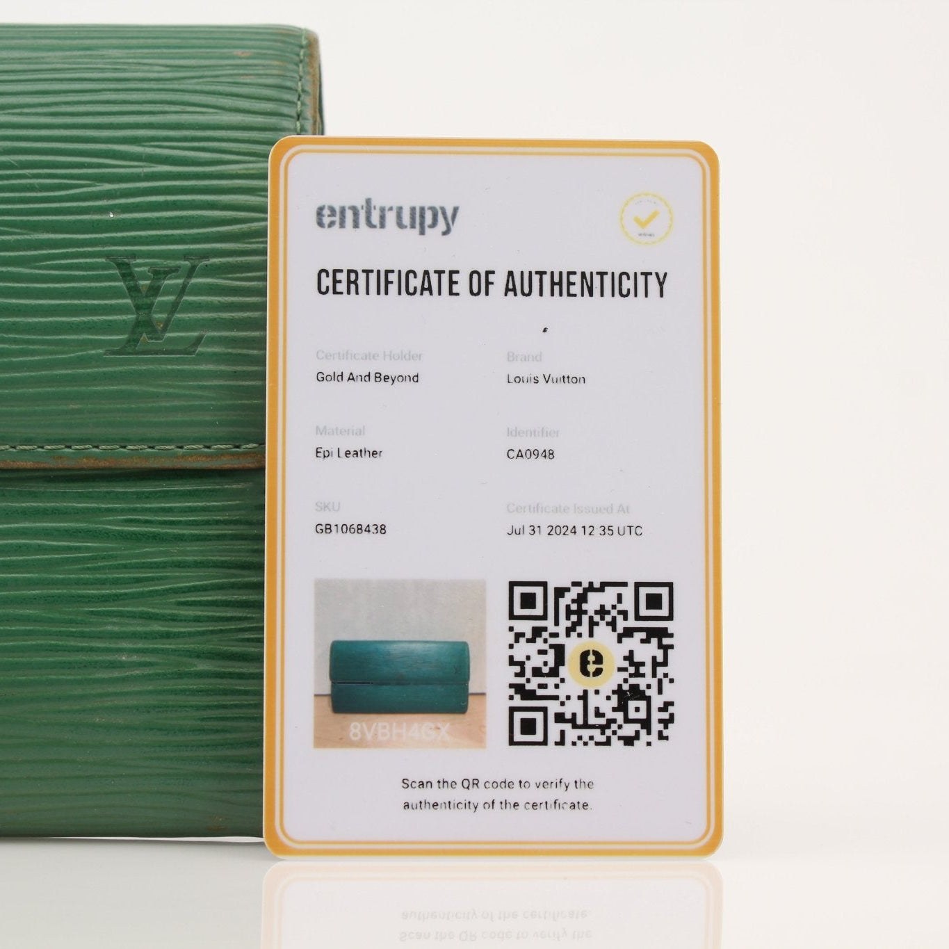 Louis Vuitton Epi Sarah Wallet Ora by Gold & Beyond, showcasing the textured leather wallet with multiple card slots and compact design.