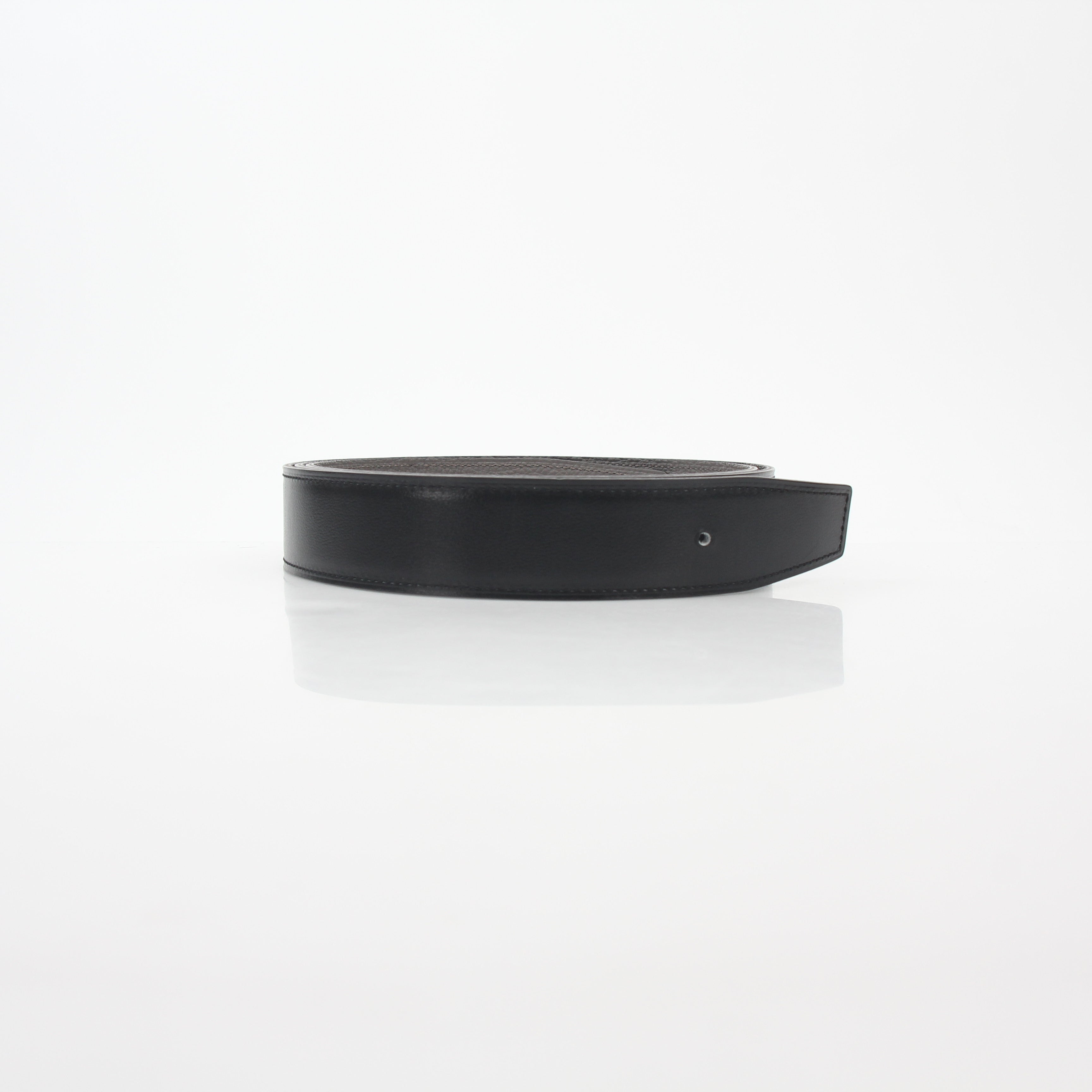 Hermès black and Etoupe reversible leather belt strap, accessories by Gold & Beyond, showing the high-quality leather and reversible design.