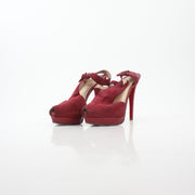 Christian Louboutin Red Orlan 140 suede T-strap heels with stiletto heel and elegant design.
