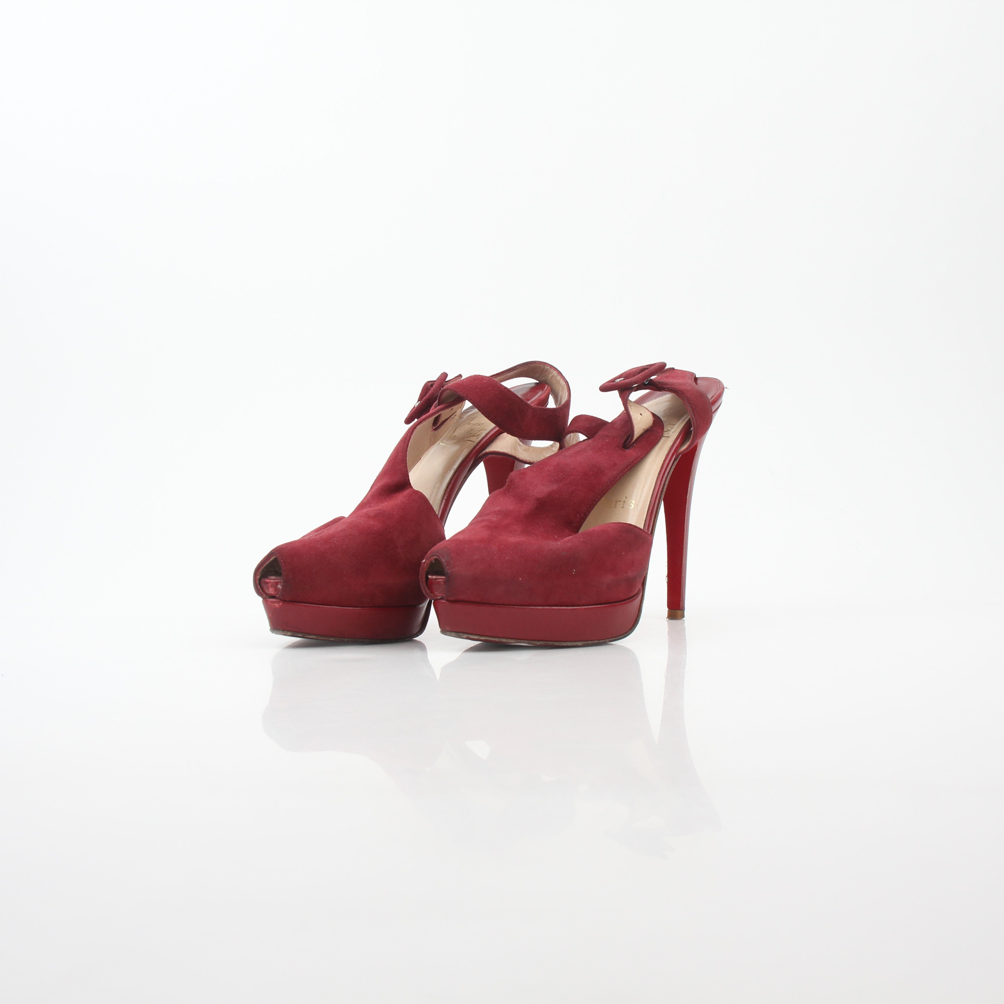 Christian Louboutin Red Orlan 140 suede T-strap heels with stiletto heel and elegant design.