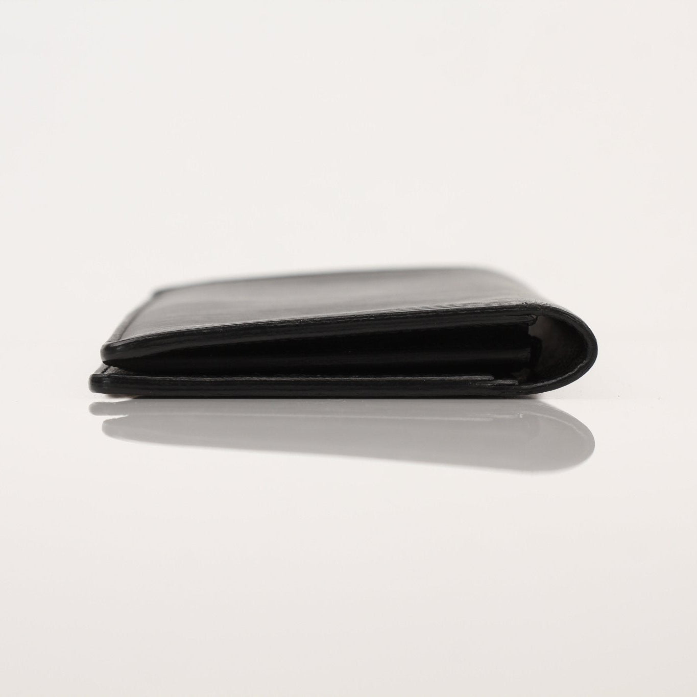 Louis Vuitton Epi Brazza wallet by Gold & Beyond, showcasing black textured leather with multiple card slots and a sleek design.
