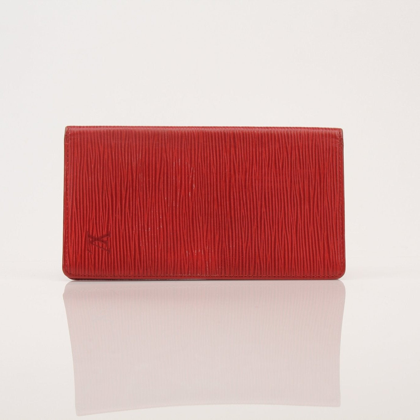 Louis Vuitton Epi checkbook wallet by Gold & Beyond, showing textured leather exterior and interior compartments.
