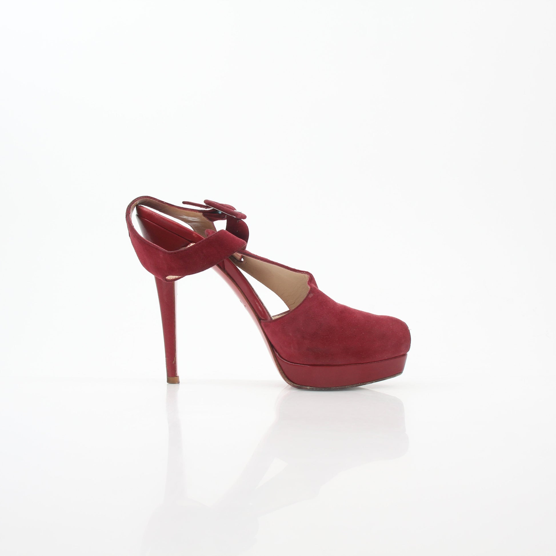 Red Christian Louboutin Orlan 140 suede T-strap heels with signature red sole and elegant heel design.