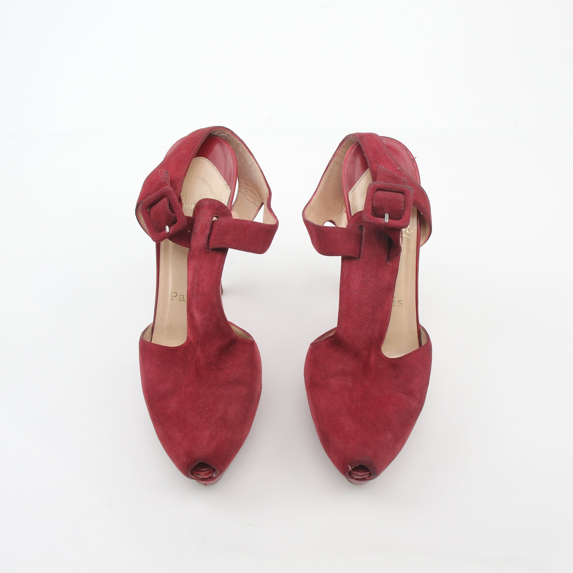 Christian Louboutin Red Orlan 140 suede T-strap heels with sleek design and signature red sole on a neutral background.