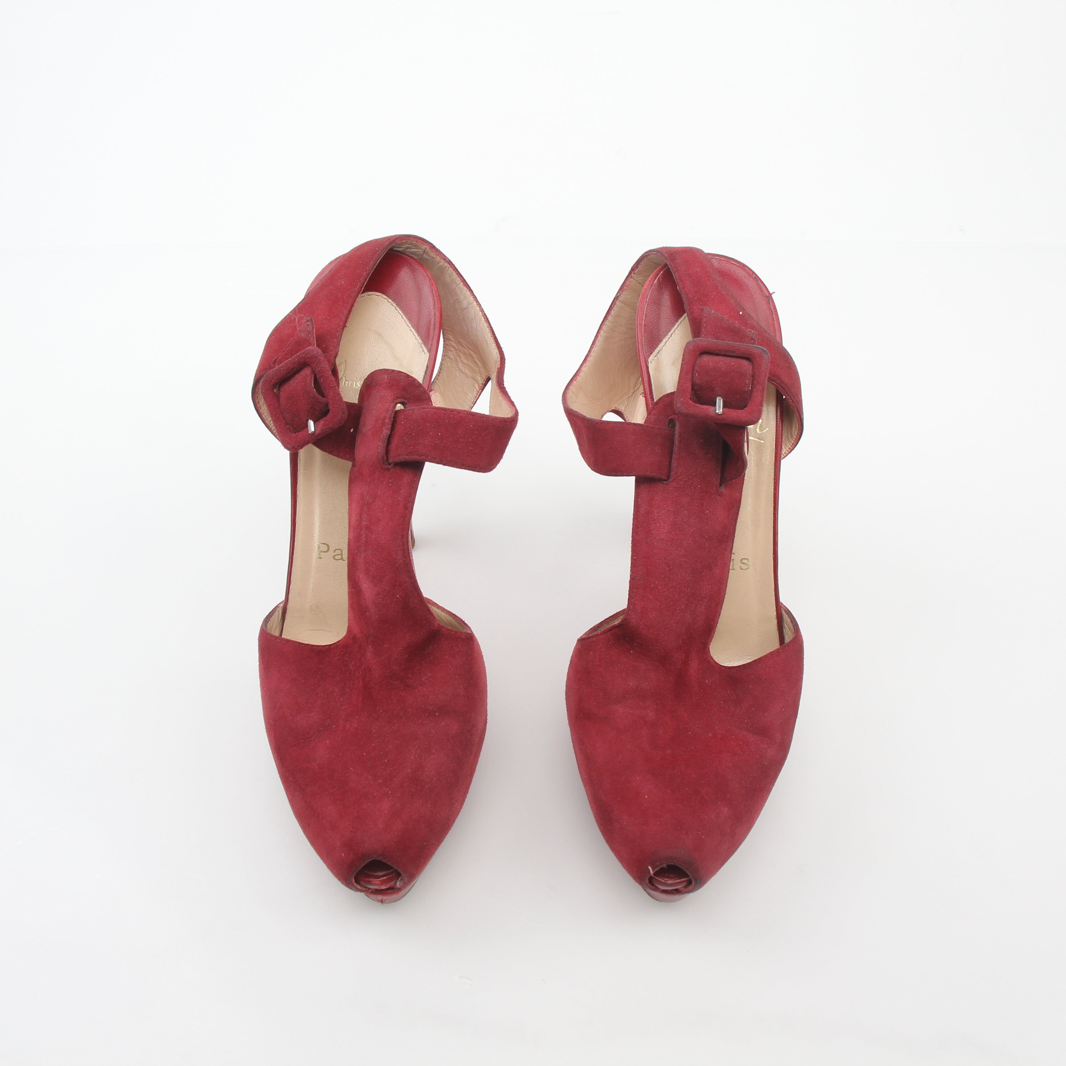 Christian Louboutin Red Orlan 140 suede T-strap heels with sleek design and signature red sole on a neutral background.