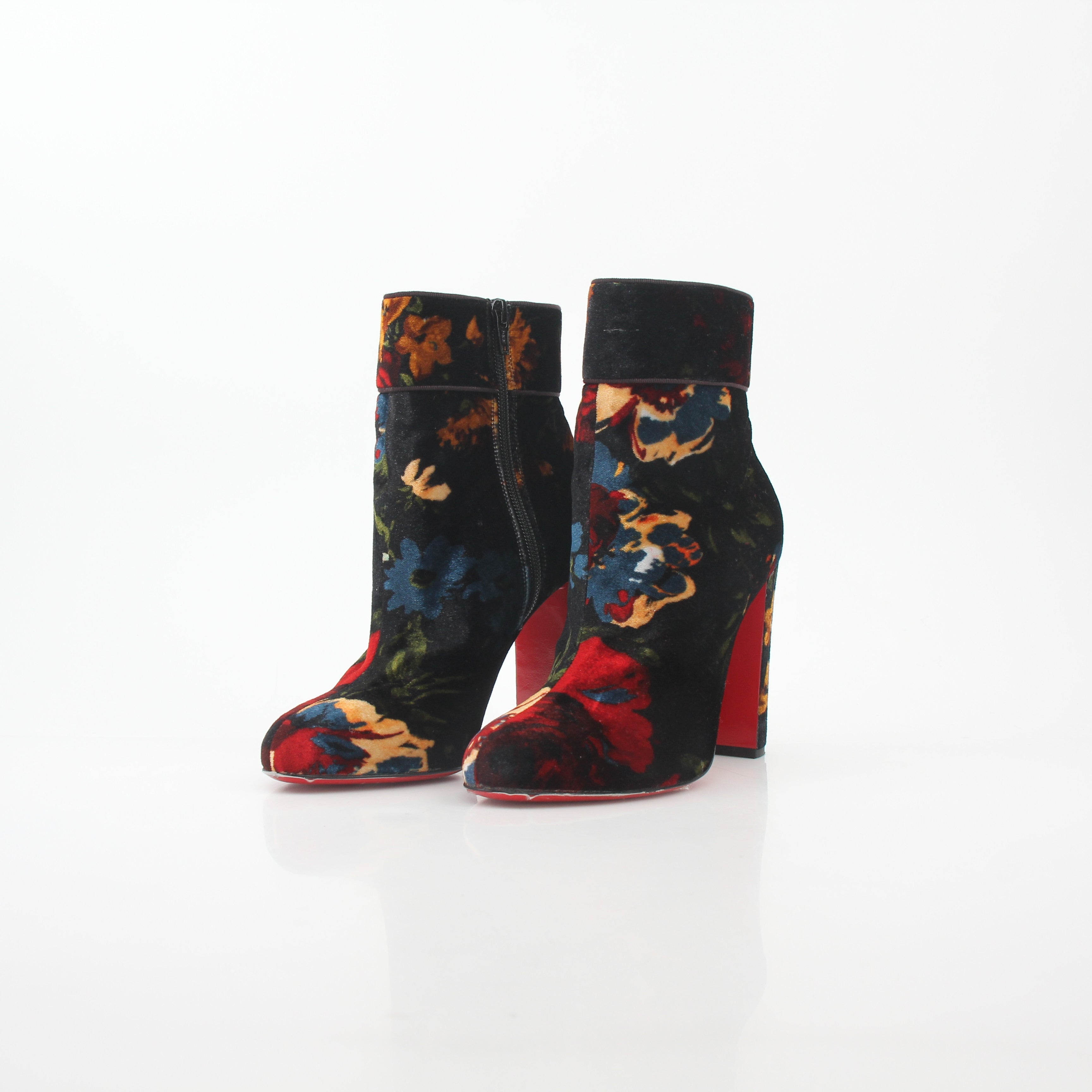Christian Louboutin Moulamax floral velvet ankle boots, stylish shoes featuring vibrant floral embroidery and a sleek design.