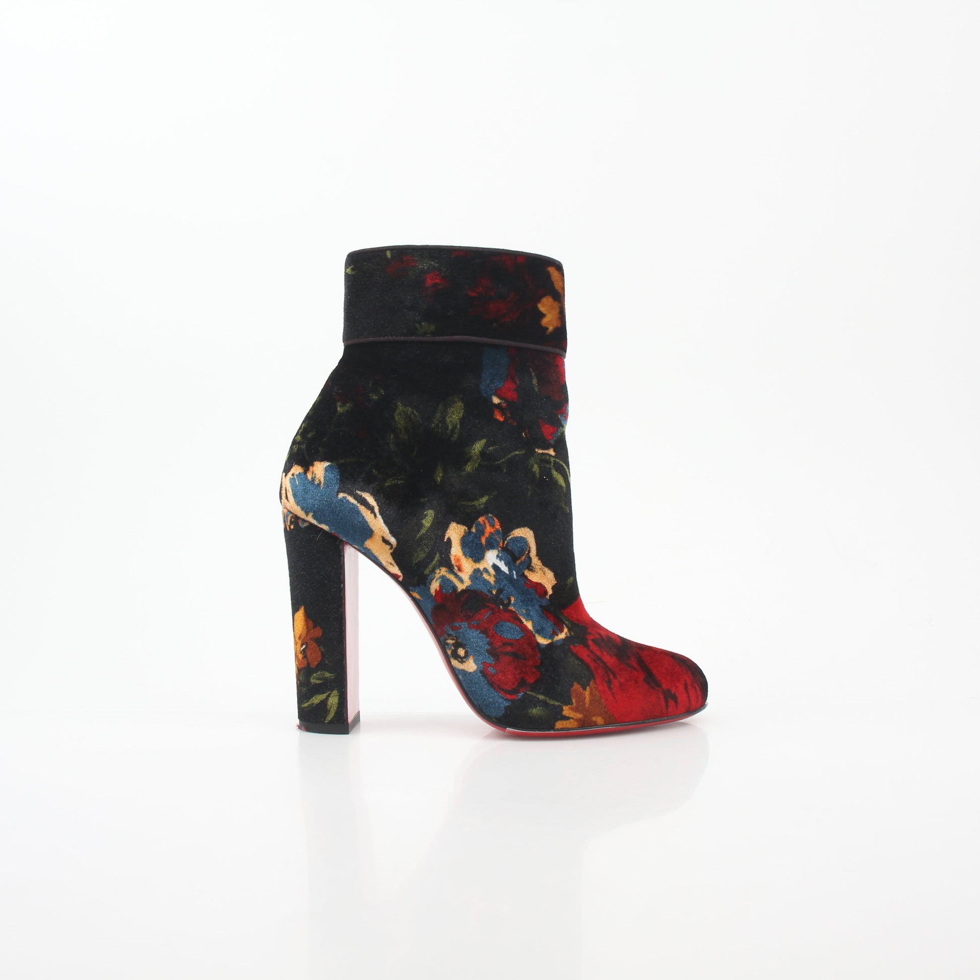Christian Louboutin Moulamax floral velvet ankle boots with intricate flower embroidery and sleek black heel.