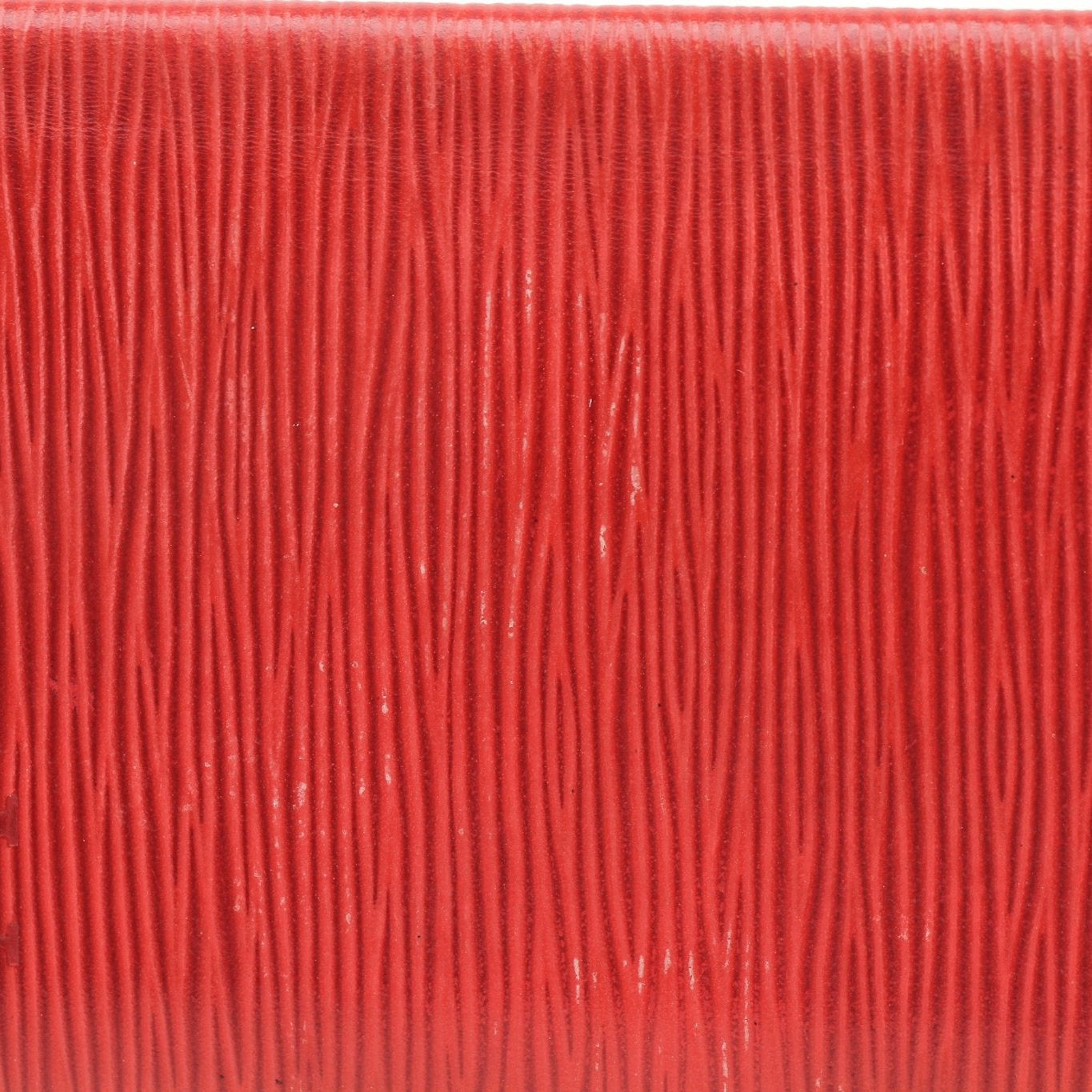 Louis Vuitton Epi checkbook wallet in textured leather with gold accents, featuring multiple card slots and a spacious cash compartment.