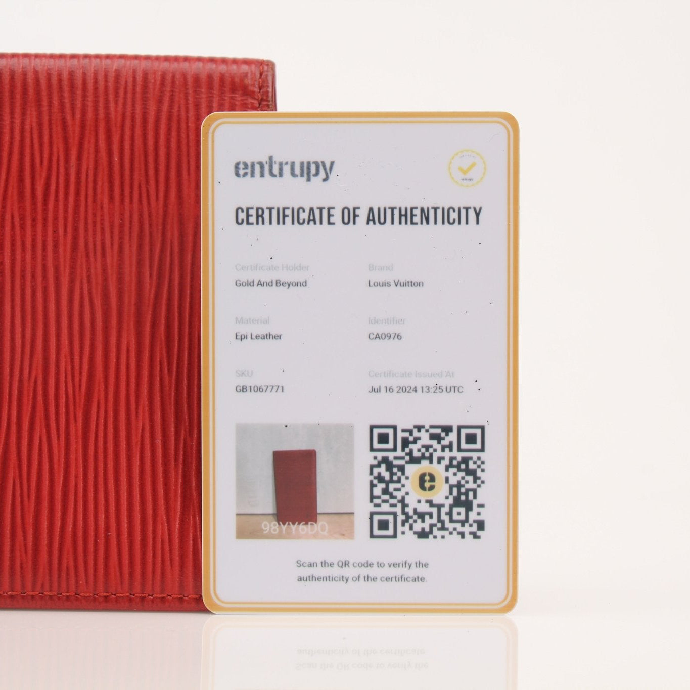 Louis Vuitton Epi Checkbook Wallet by Gold & Beyond, featuring textured leather, gold-tone hardware, and multiple card slots.